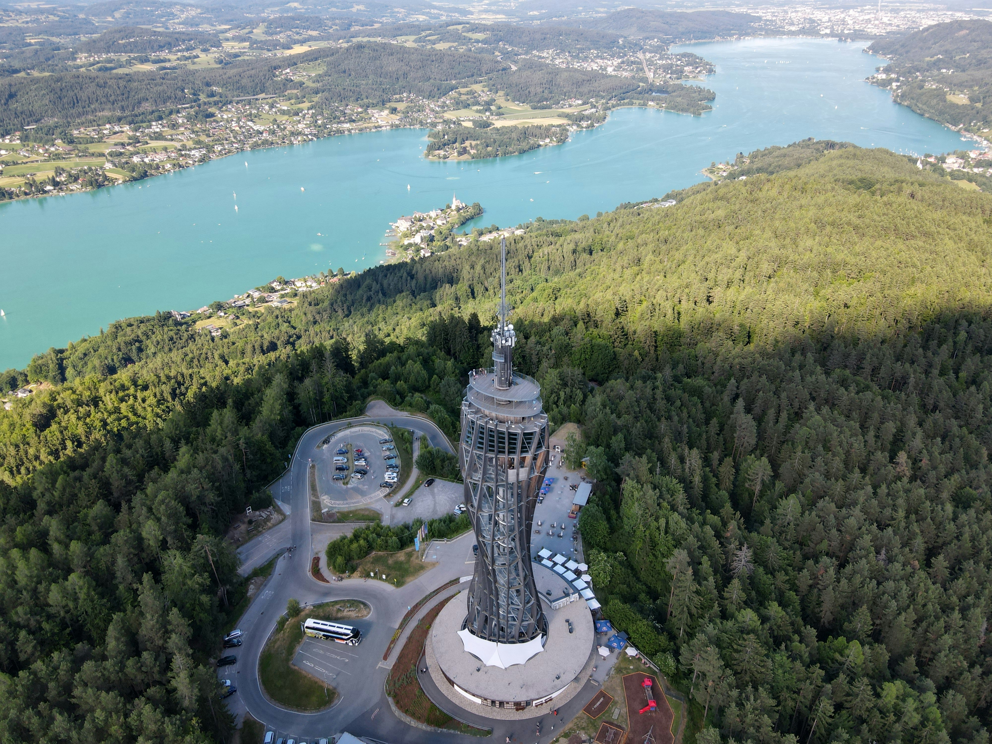 Aerial view of the Pyramidenkogel observation tower overlooking Lake Wörthersee in Austria