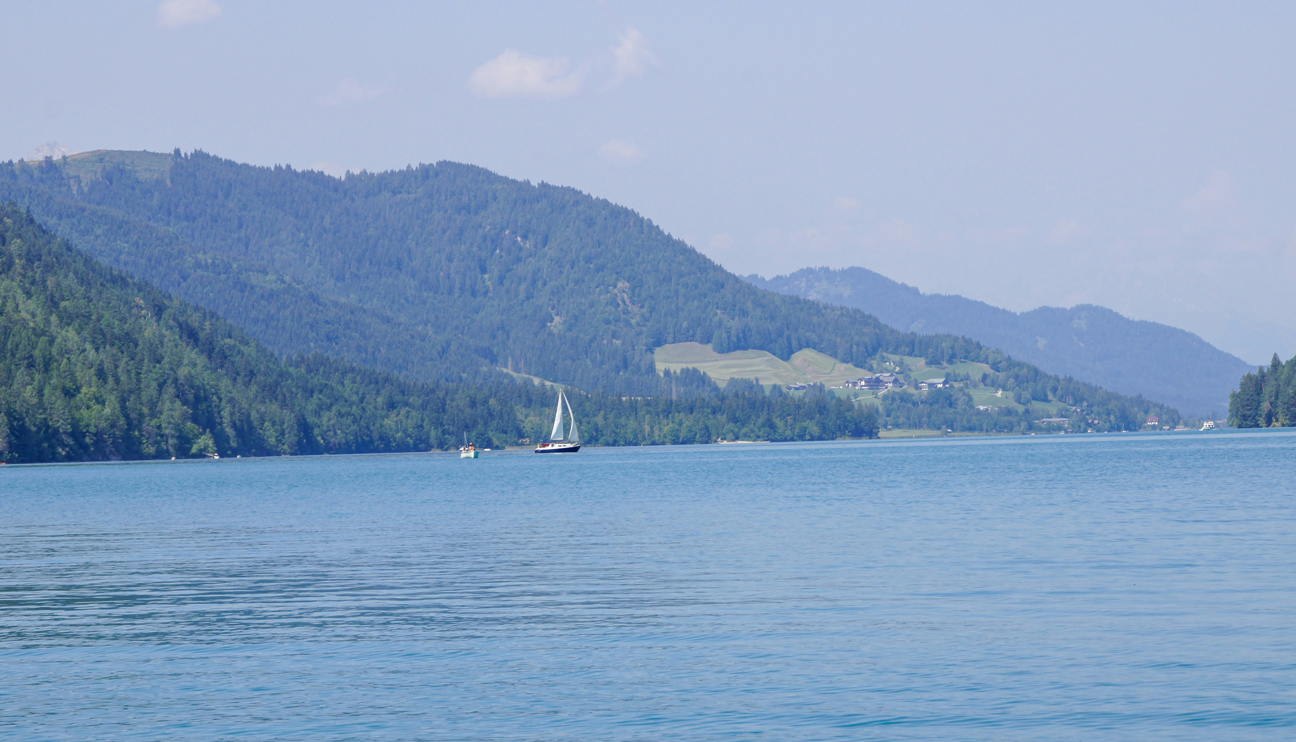 Sailboat on blue mountain lake - Free Photo on Unsplash