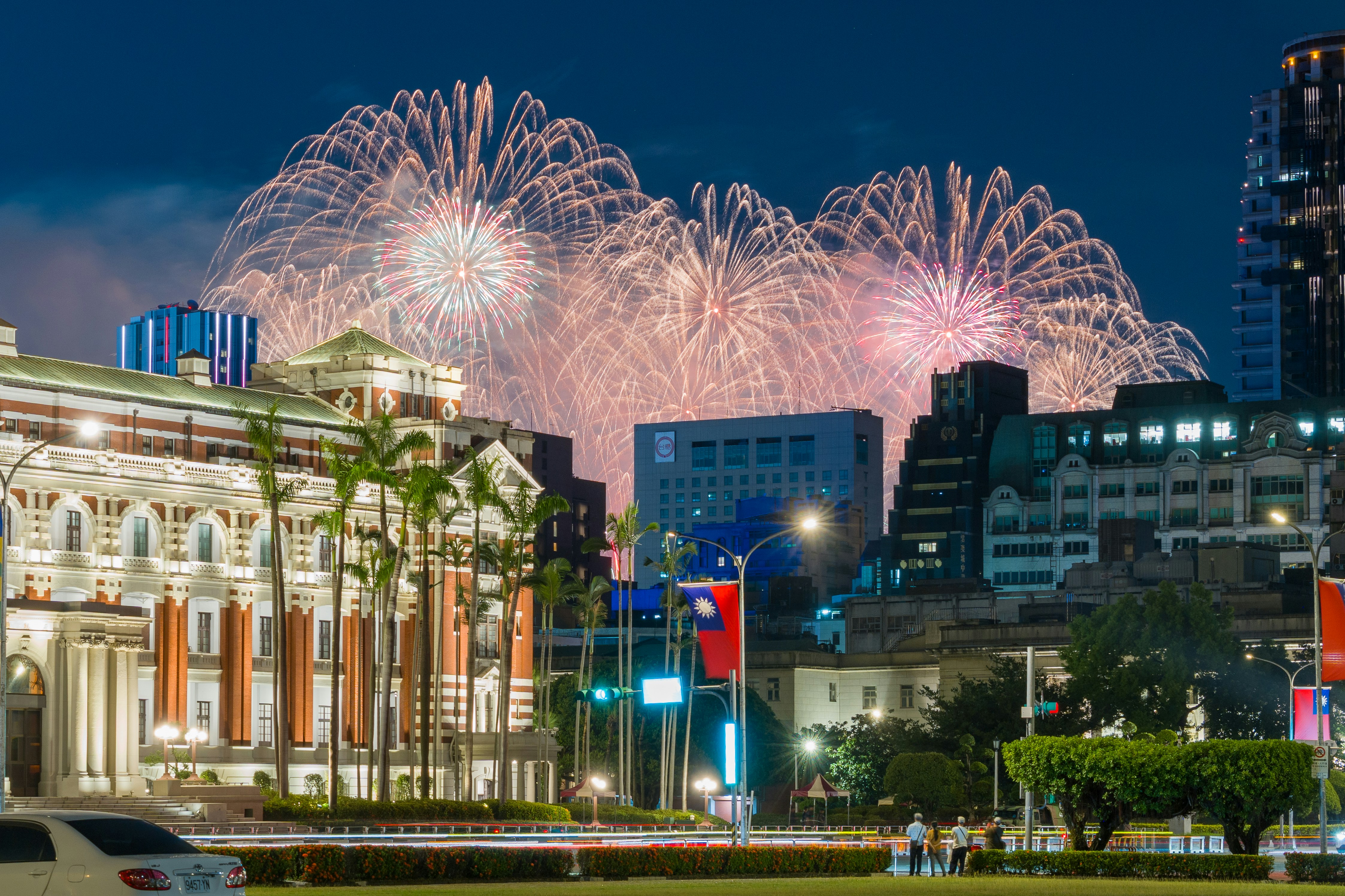 Fireworks exploding over the National Taiwan Museum in Taipei at night