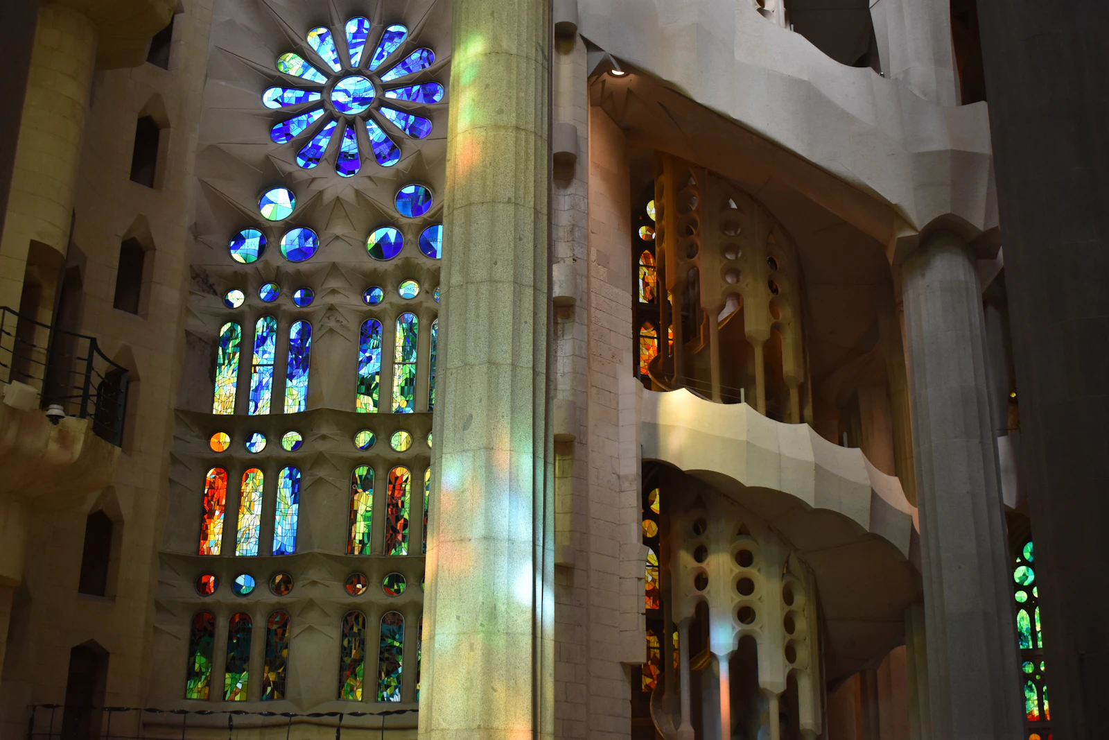 Coloured light from stained-glass windows inside the Sagrada Familia.