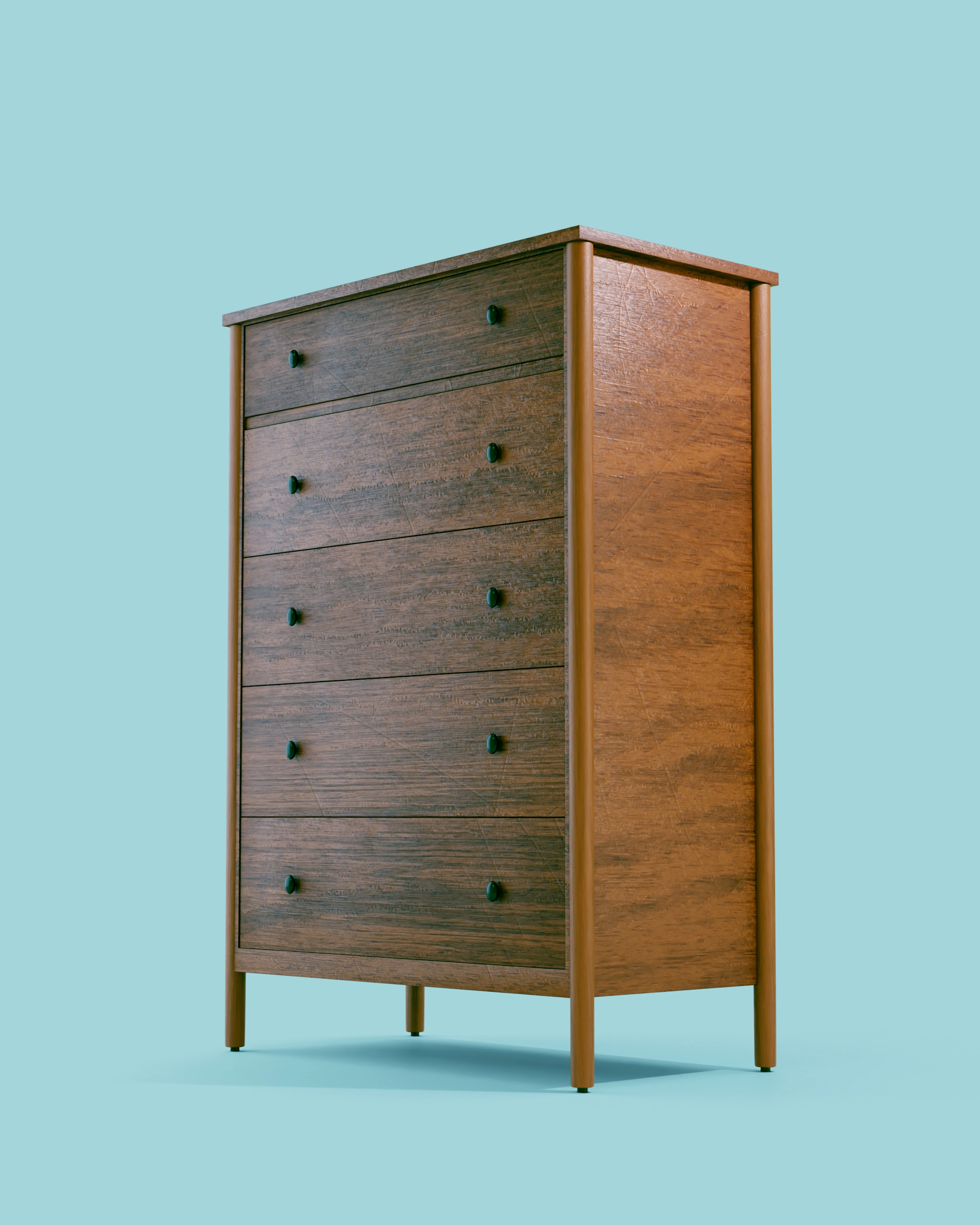 Wooden chest of five drawers against a wall