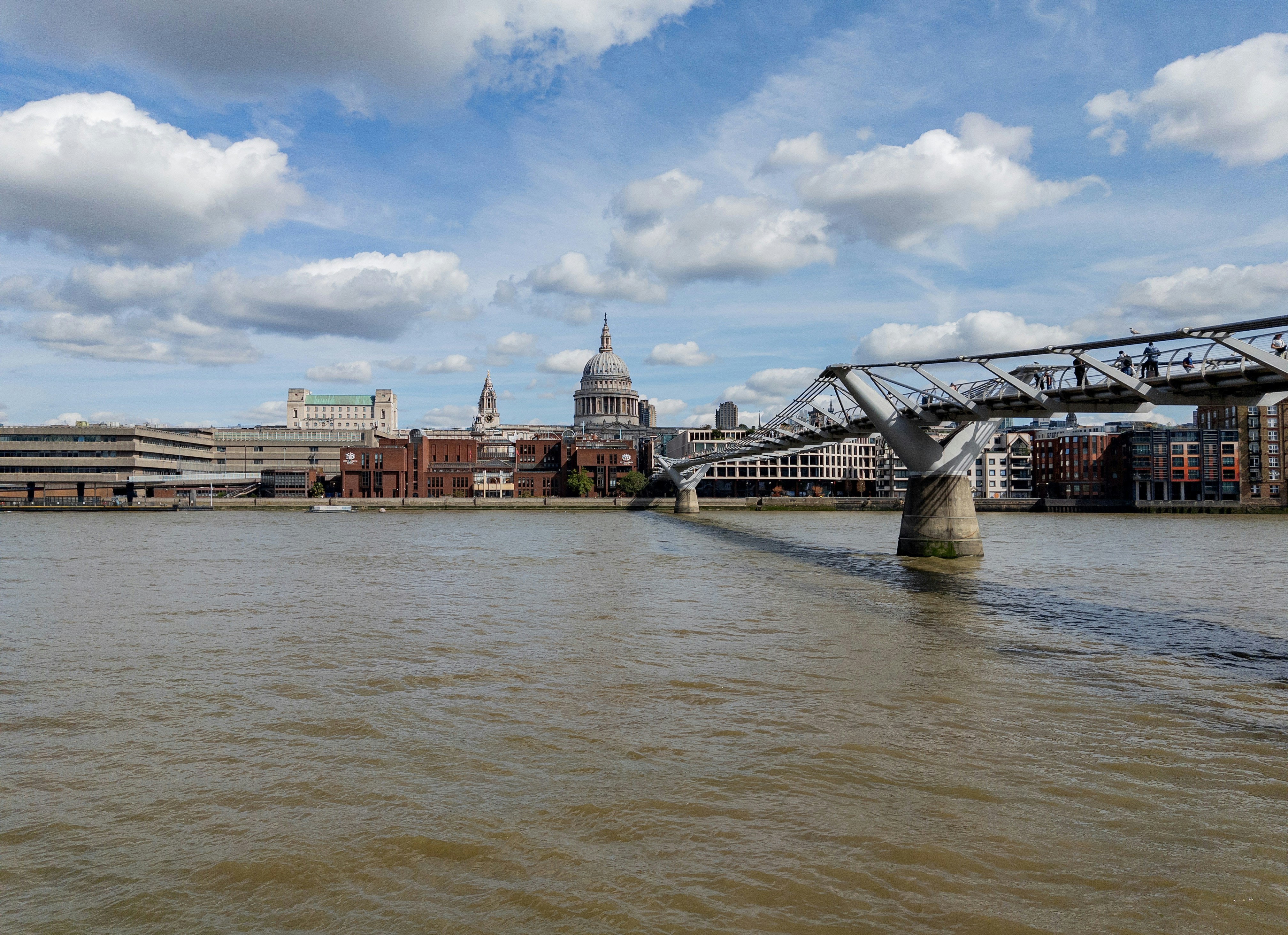 The Millennium Bridge spanning the River Thames with St Paul's Cathedral in London