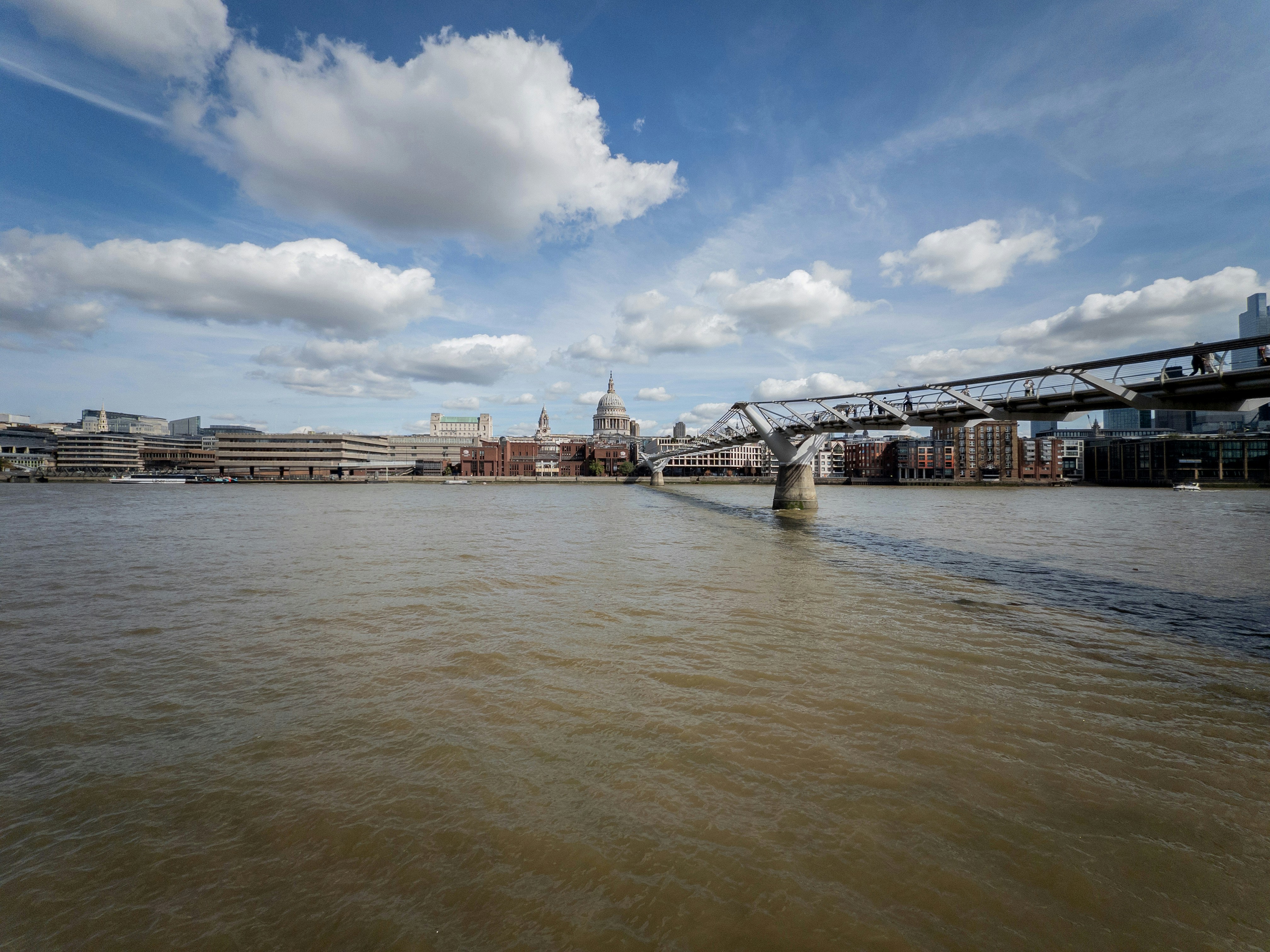 The Millennium Bridge spanning the River Thames with St Paul's Cathedral in London