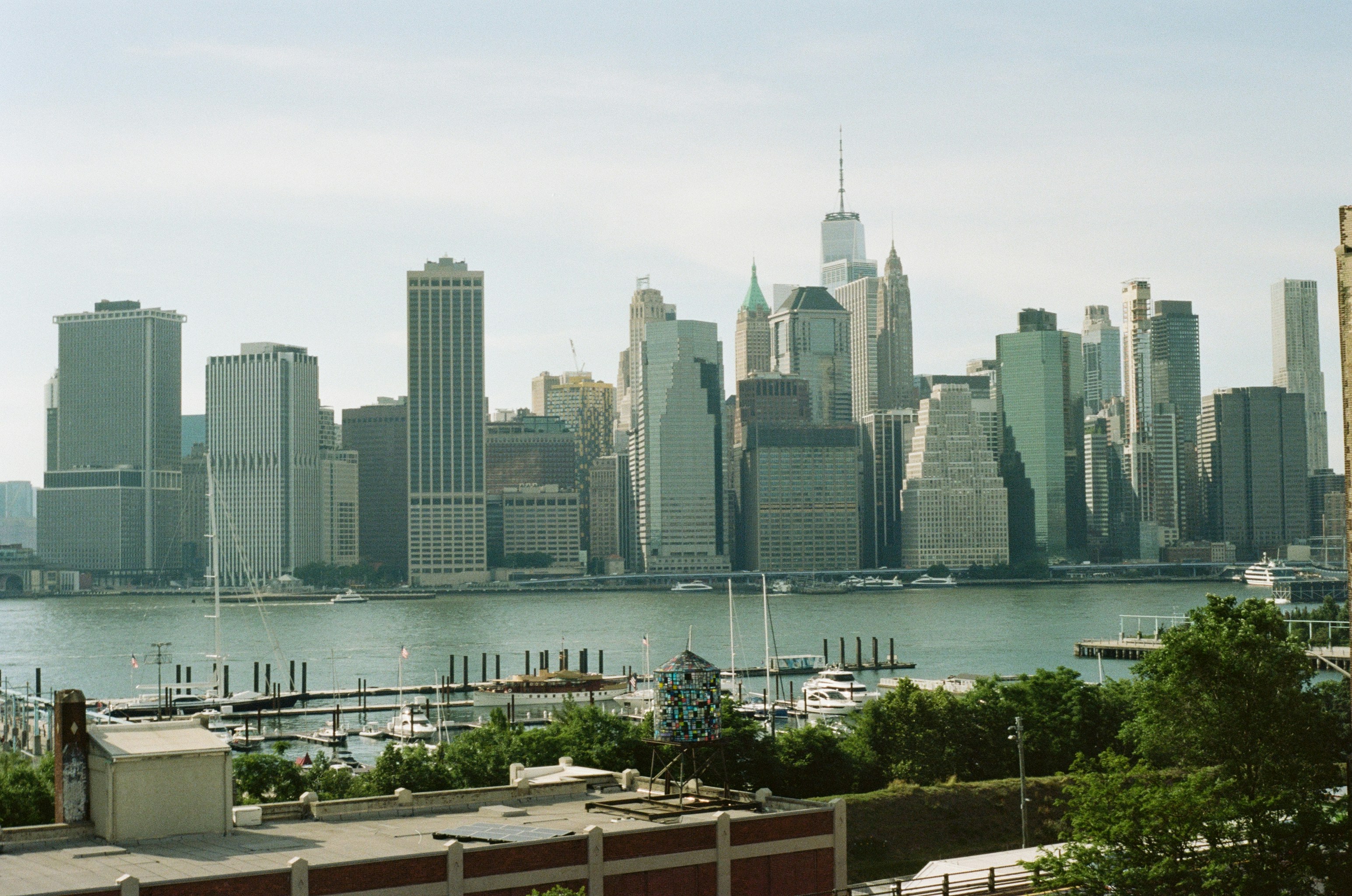 The Manhattan skyline across the East River with a marina in the foreground