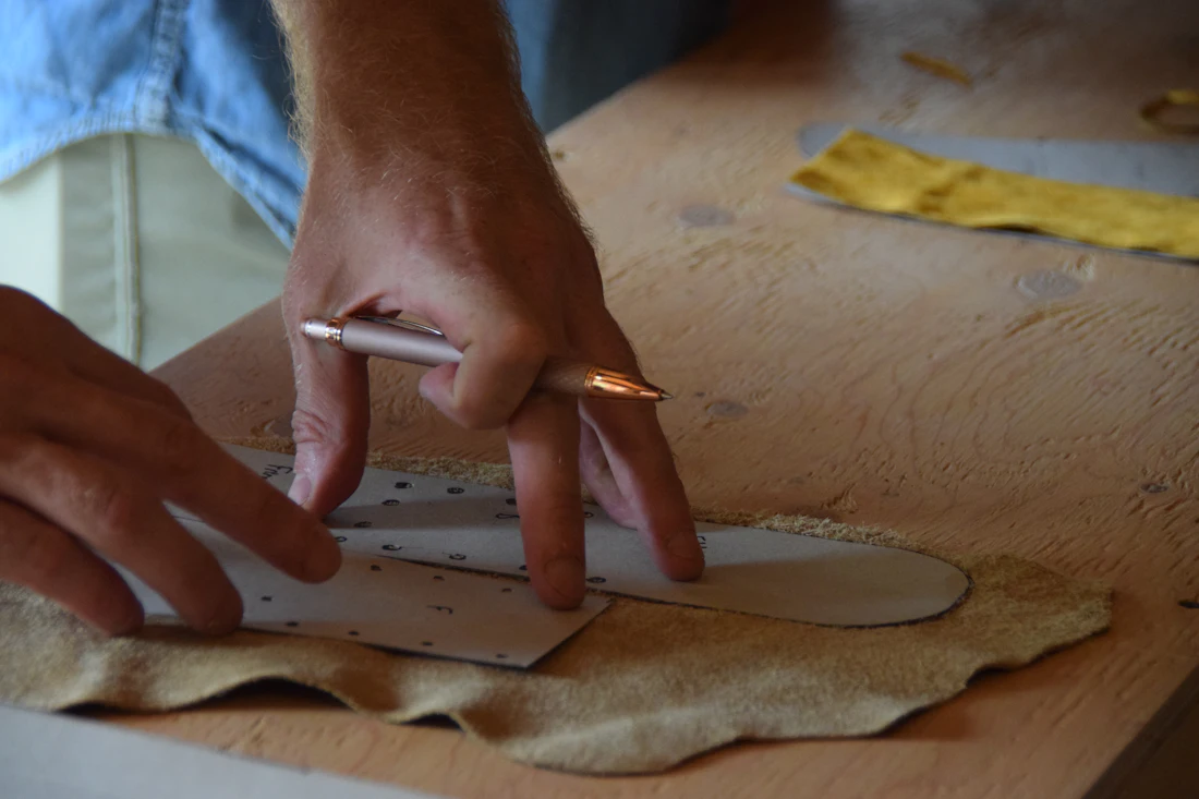 Tracing a pattern onto a hide before cutting