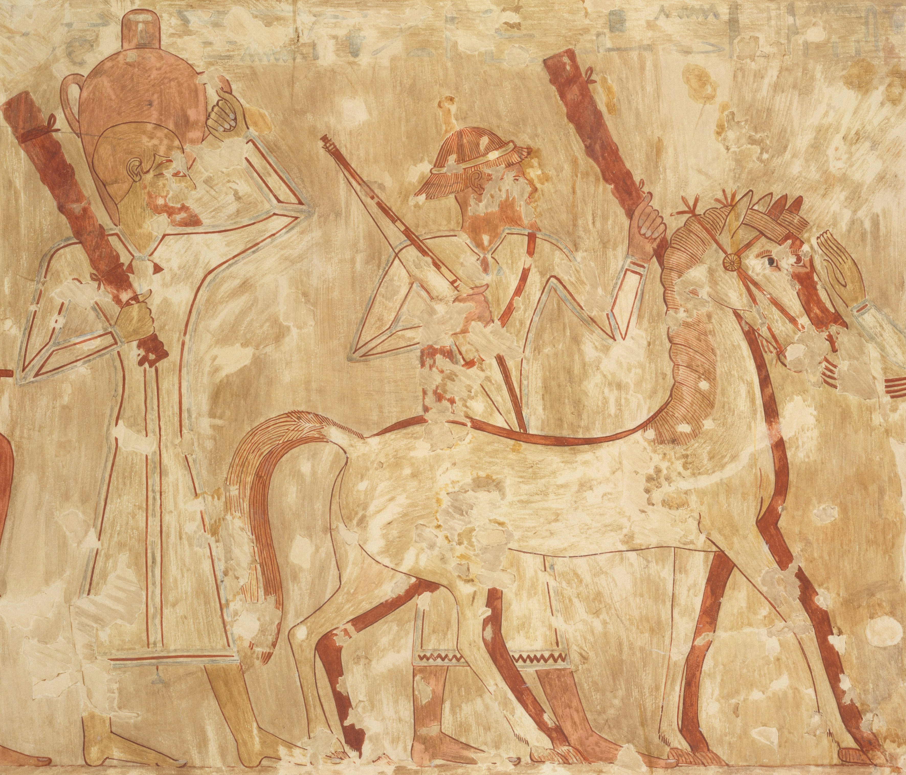 Ancient wall painting of two men with a horse in profile