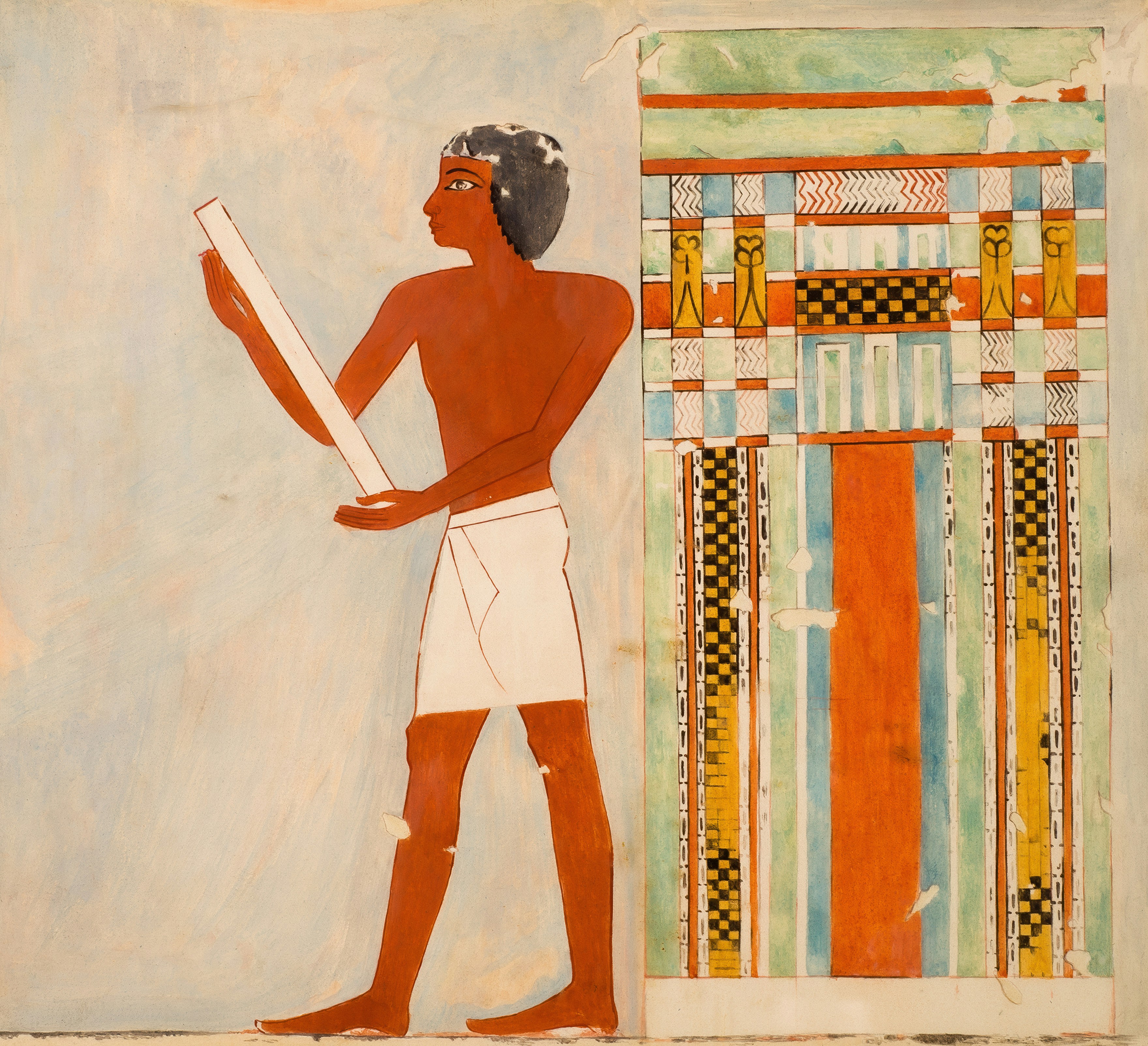 A person in a white kilt holding a long white rod beside patterned columns