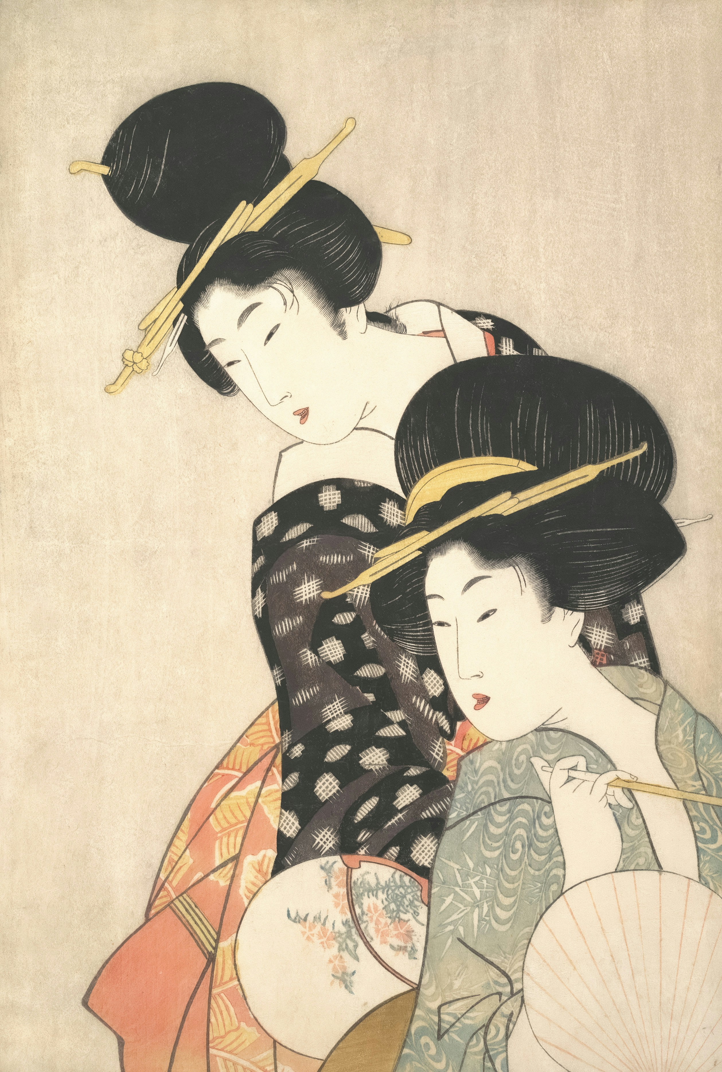 Two women in traditional patterned kimonos with elaborate hairstyles and hairpins