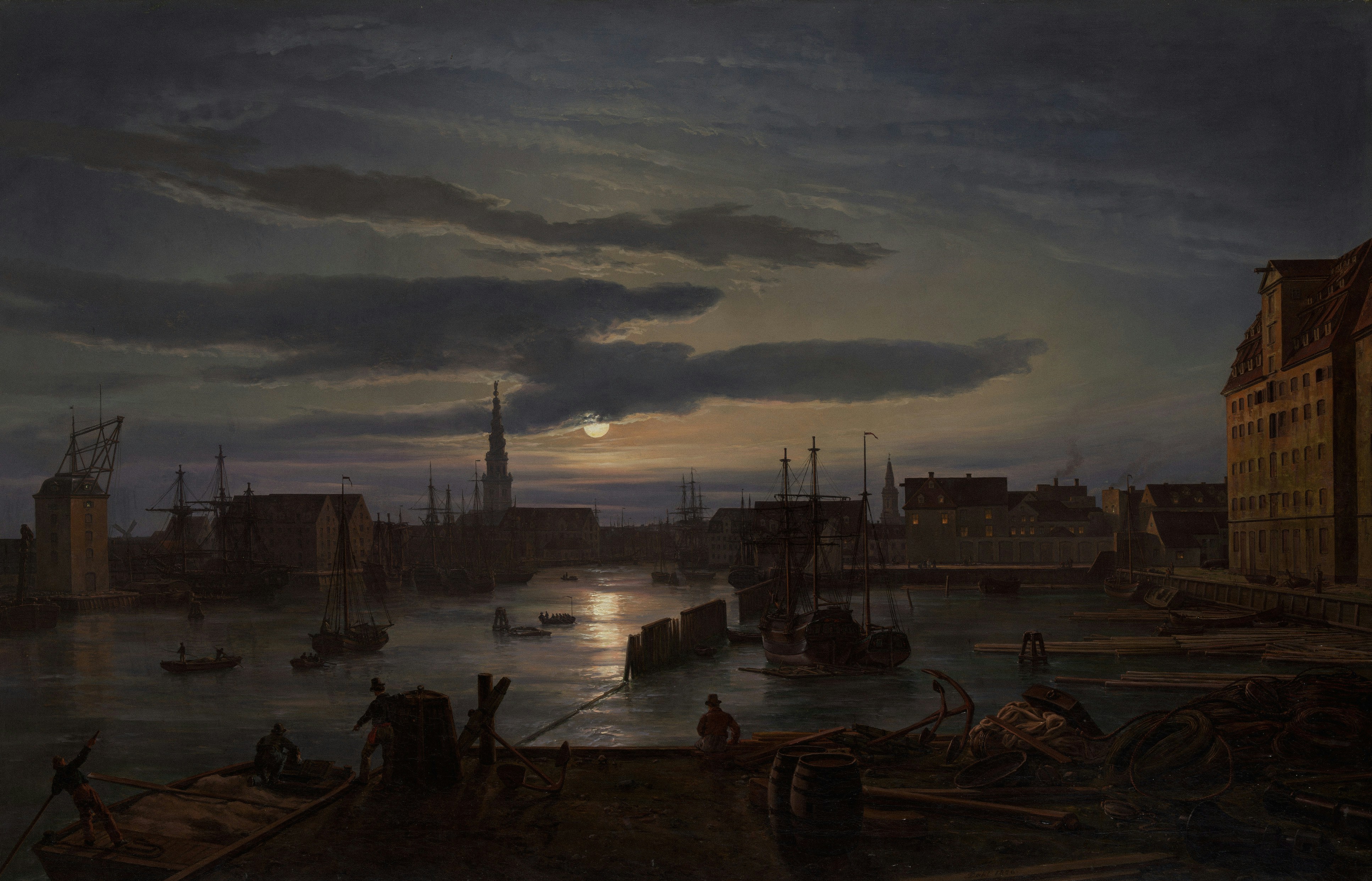 Moonlight over a harbor with sailing ships and a church spire in Copenhagen