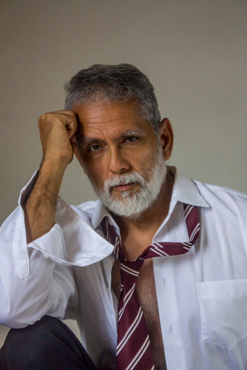 Older man feeling stressed and tired