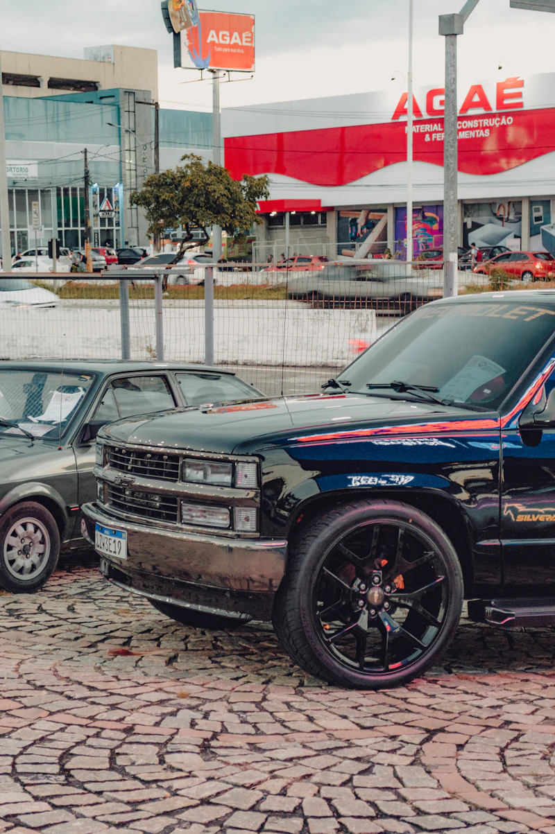 Lowered black pickup on custom wheels