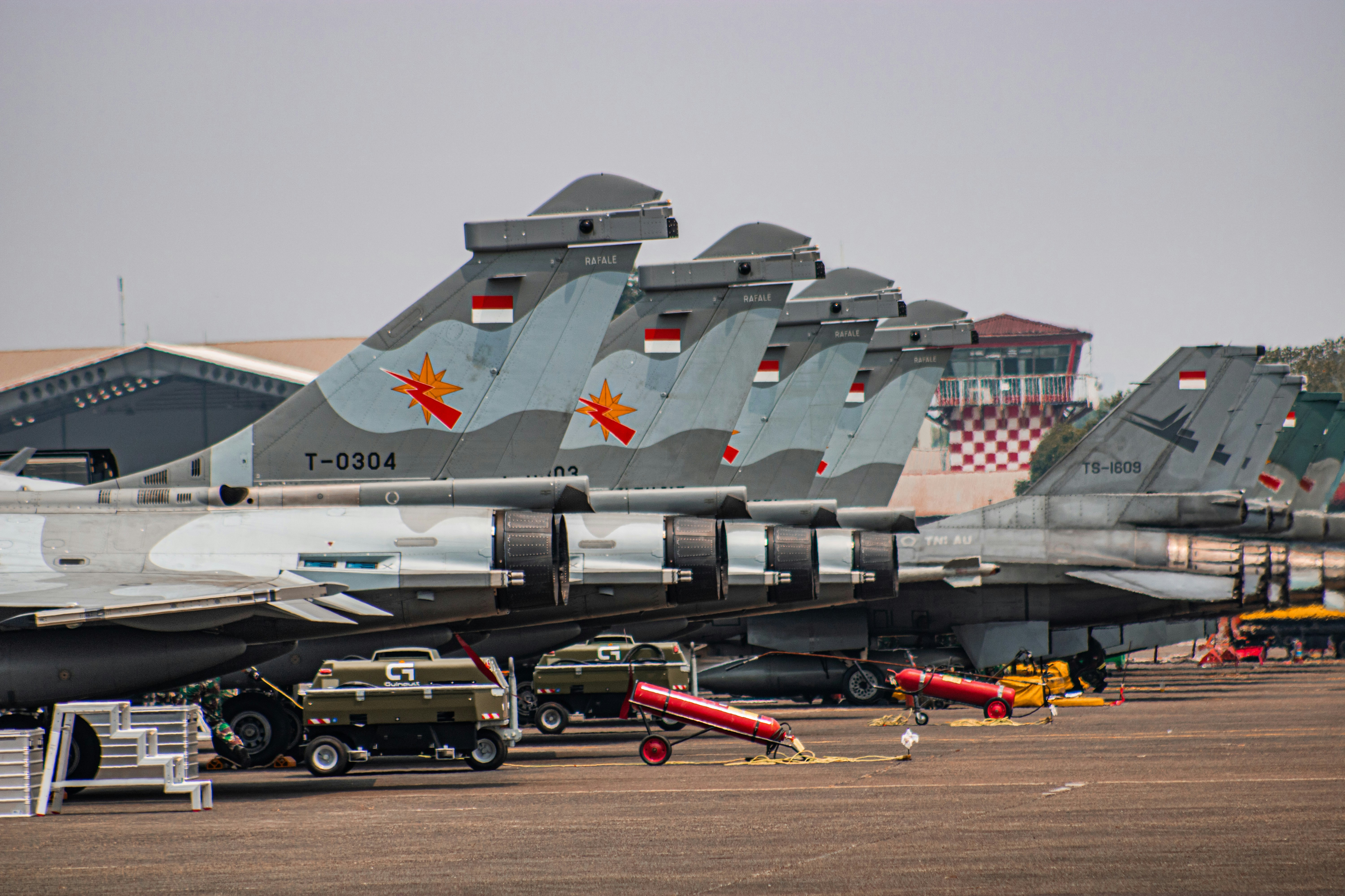 Polish fighter jets taking off from a military airbase