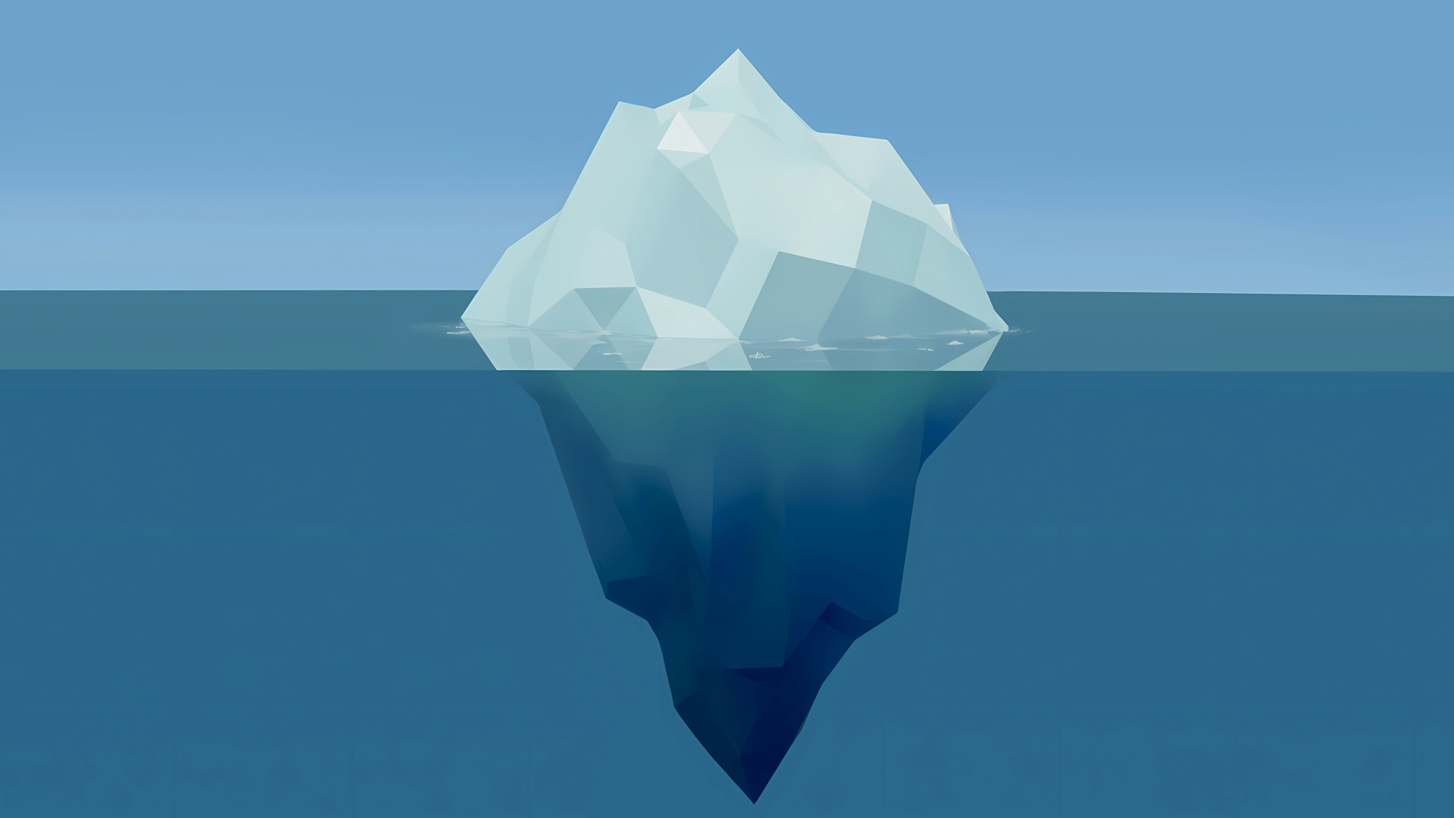 An iceberg floating in deep blue water with a clear sky above