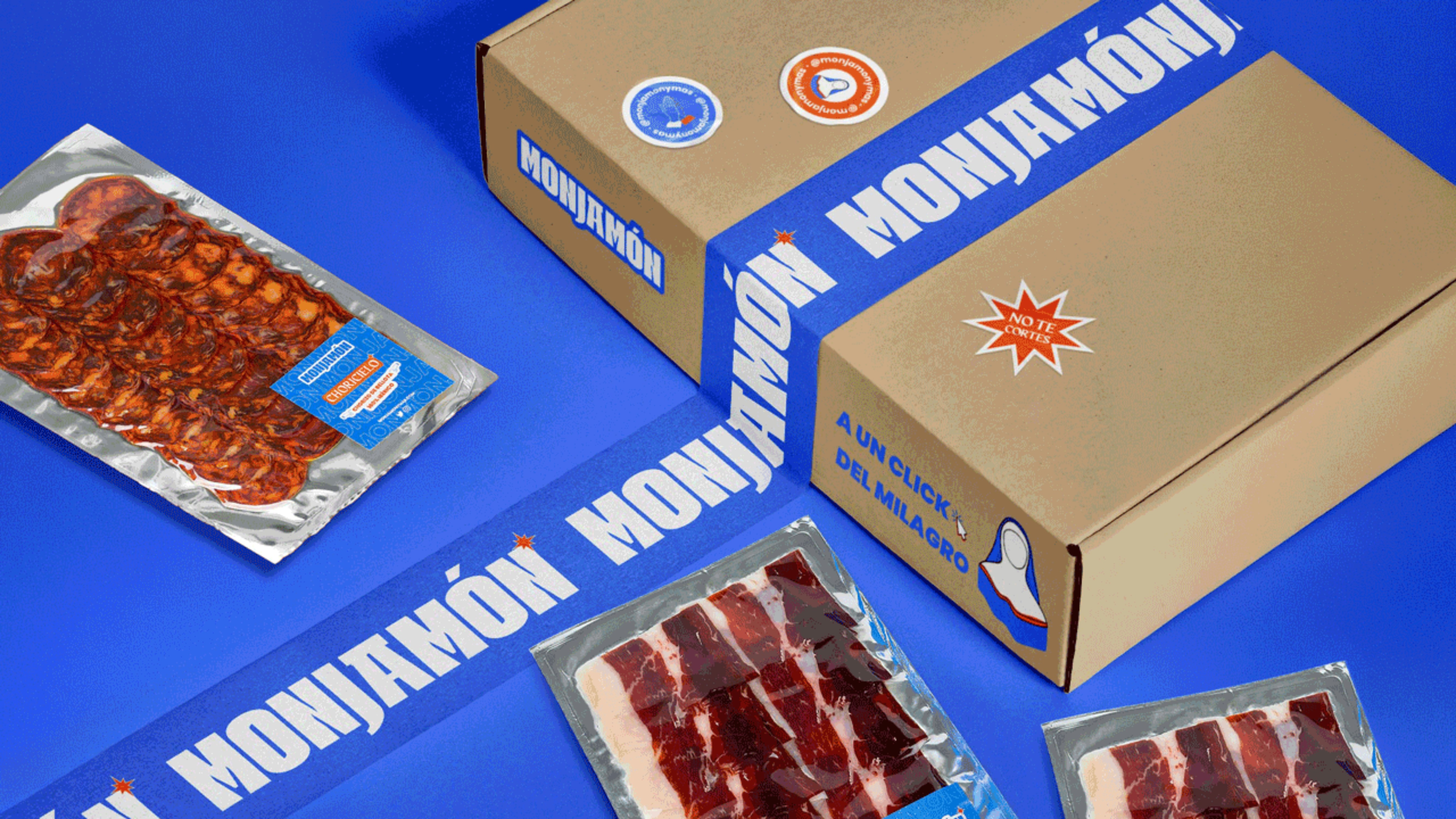 A cardboard box and vacuum-sealed packages of sliced cured meat on blue background