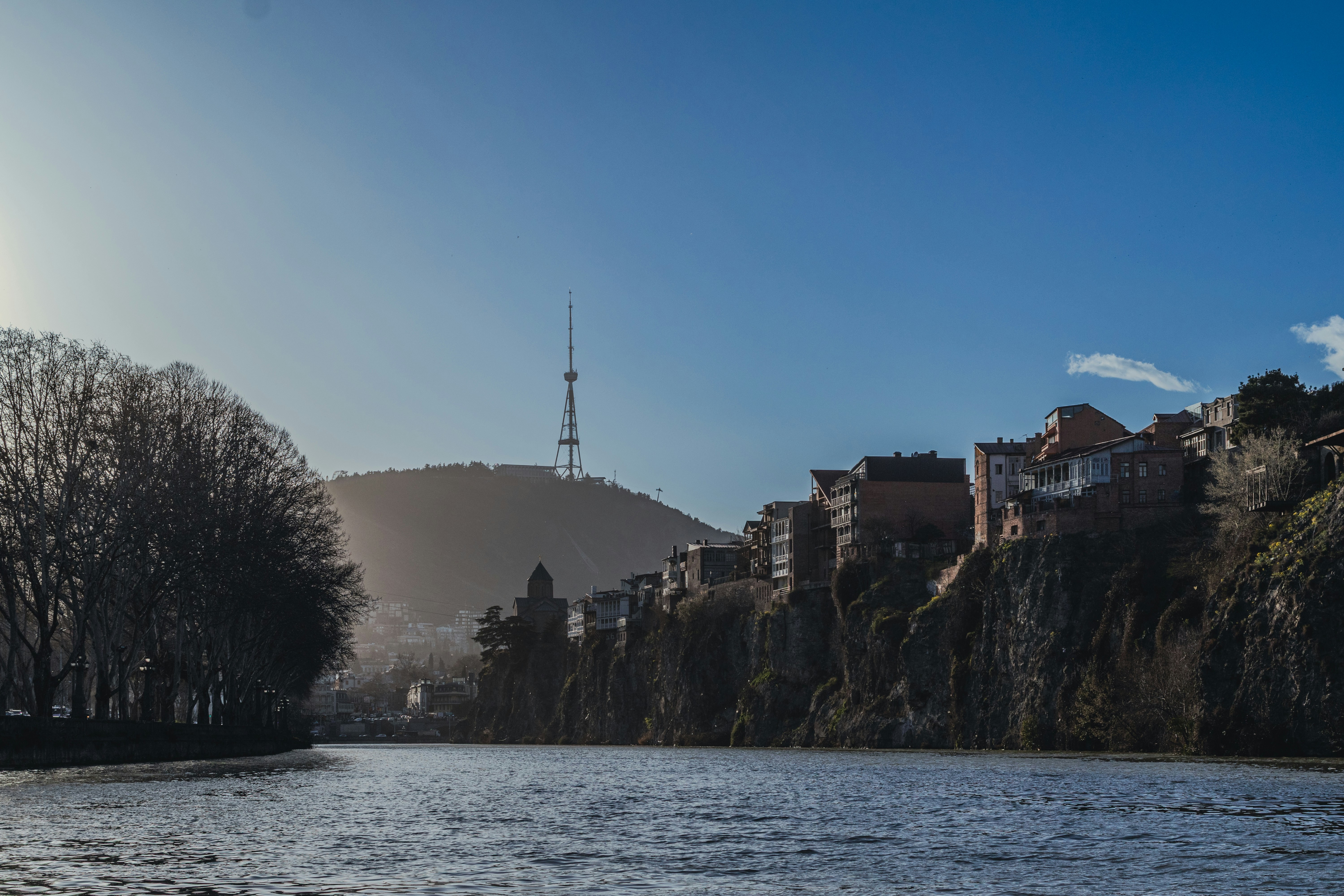 Tbilisi Old Town on the riverbank with the television tower on the hill above