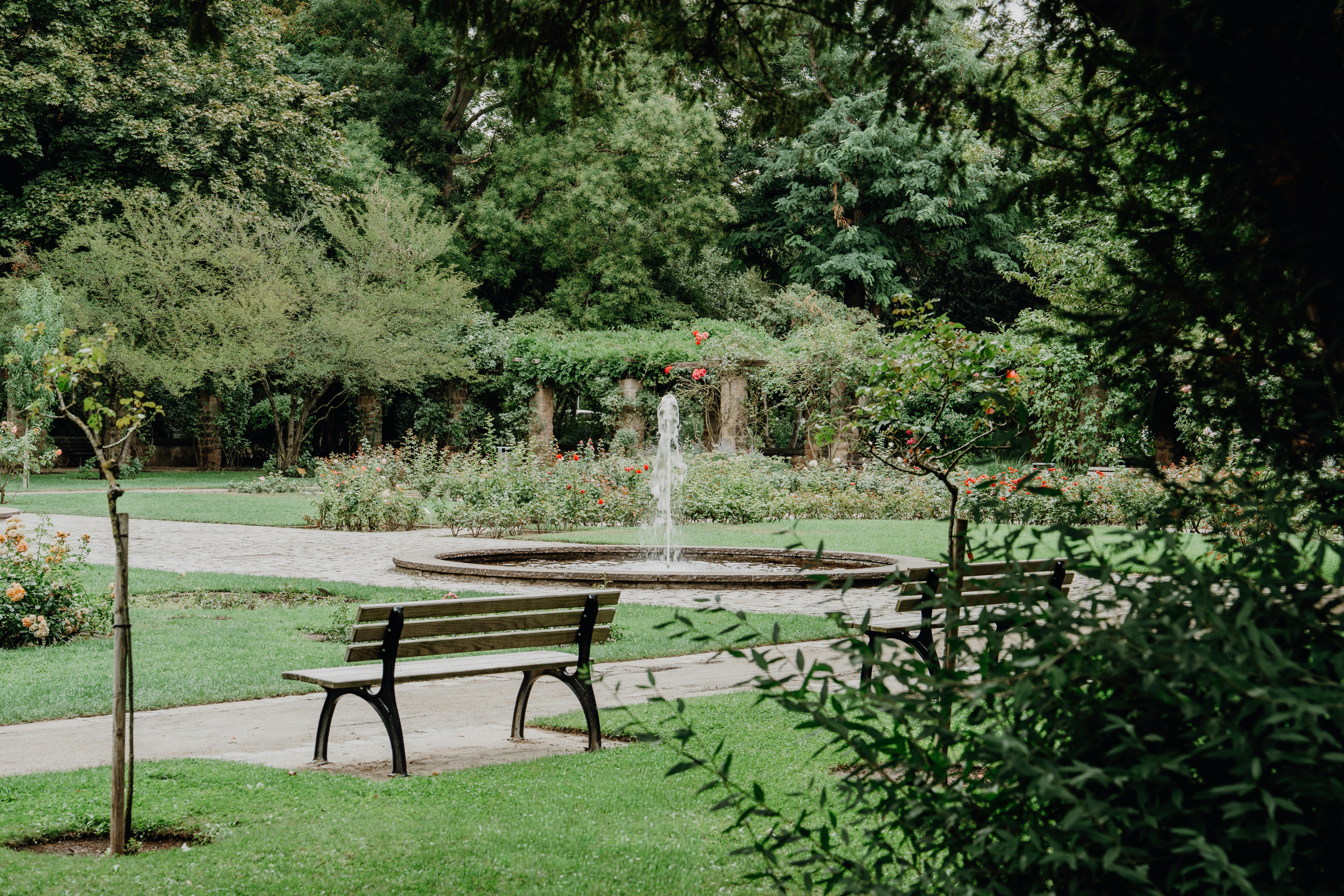 Two benches facing a fountain