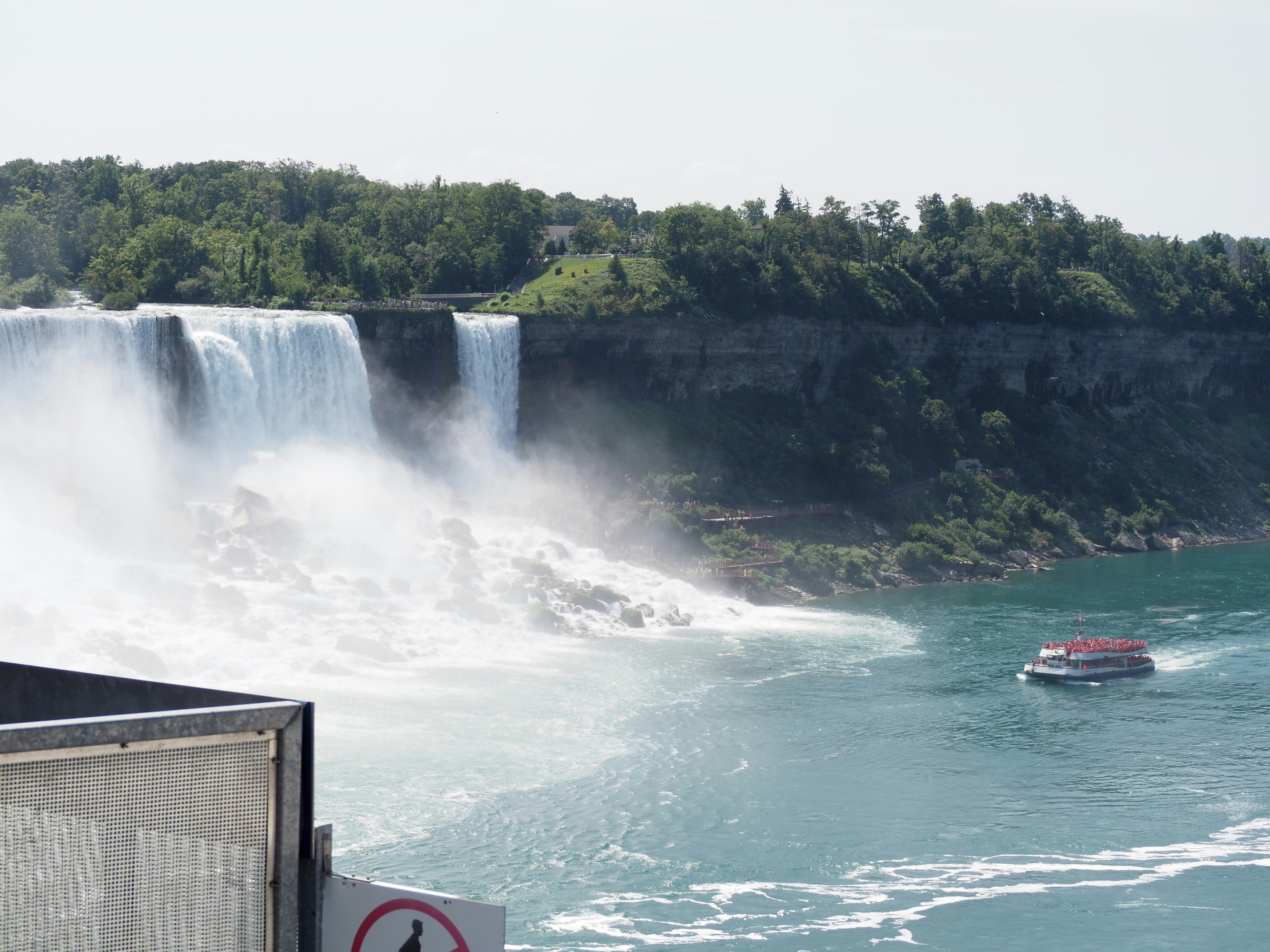 A tour boat on the Niagara River below the American Falls in Niagara Falls