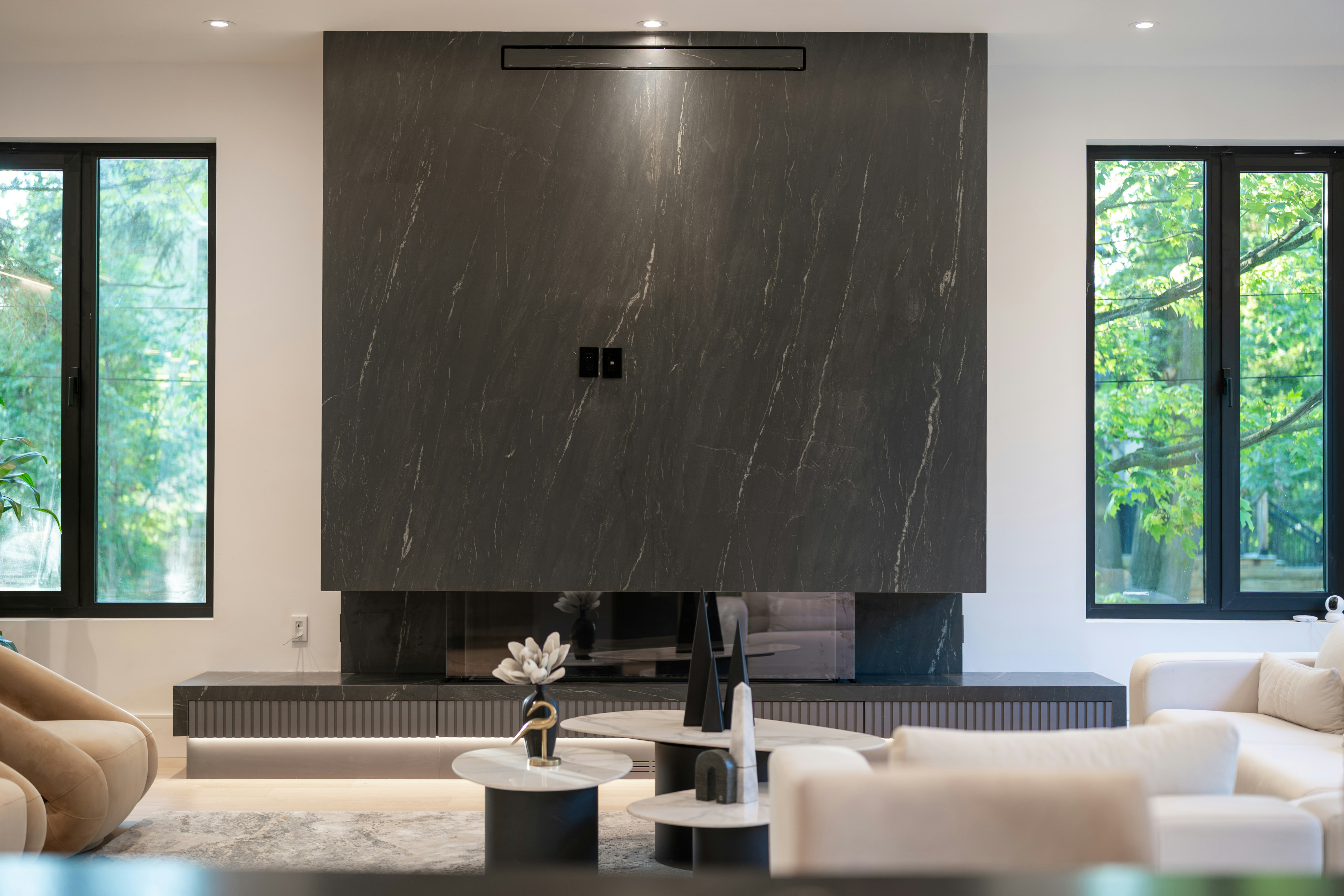 Dark marble fireplace feature wall