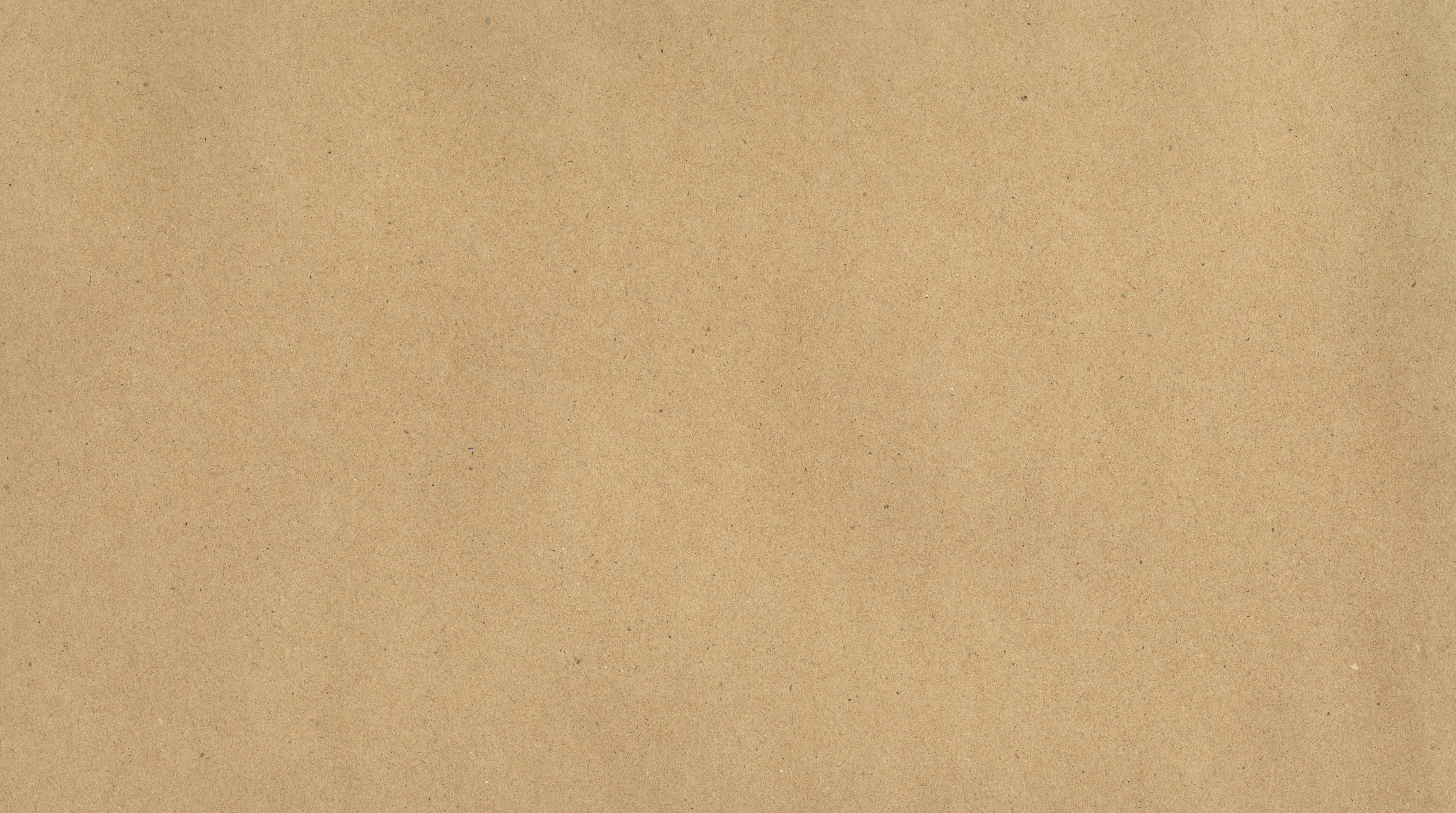 A flat sheet of light brown craft paper with a subtle textured surface