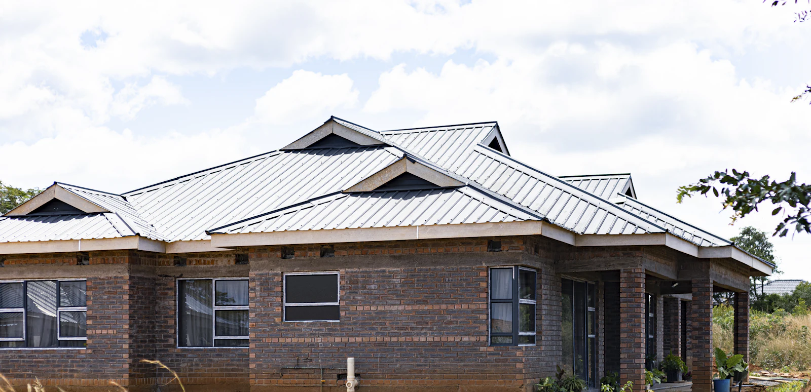 Brick home with a metal roof