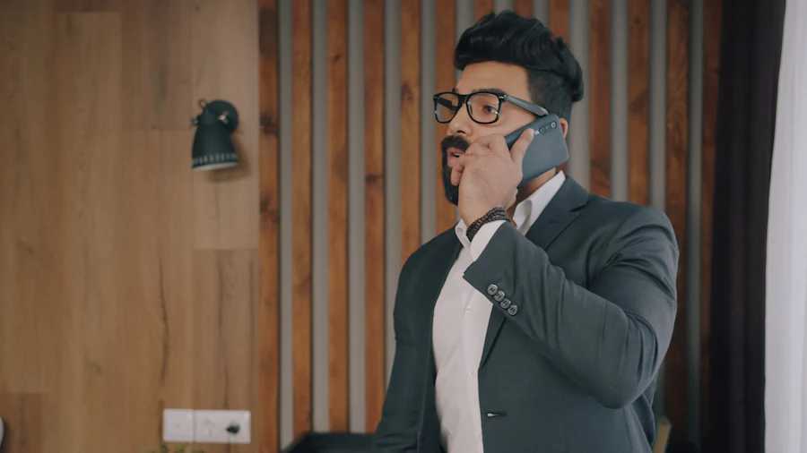 Man with a beard on a smartphone