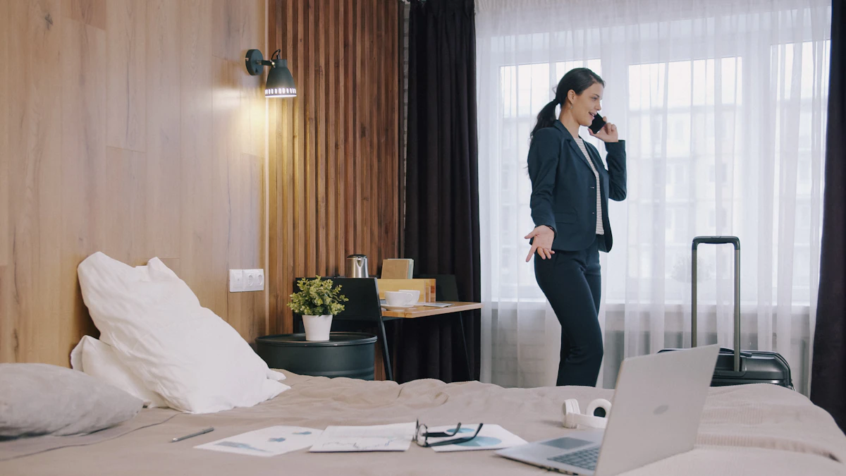 Traveler booking a hotel room on a laptop