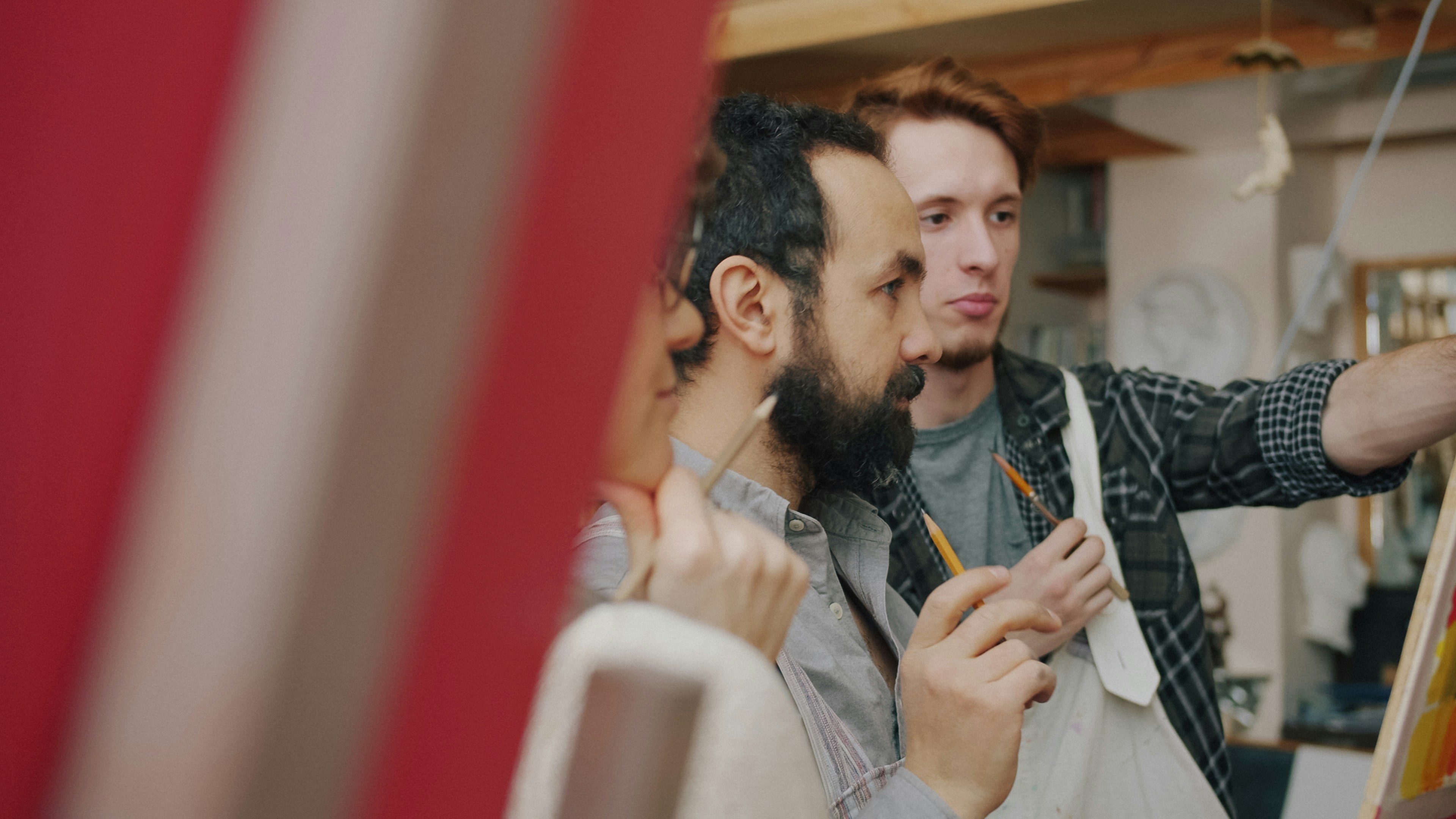 Barista teaching latte art in a workshop