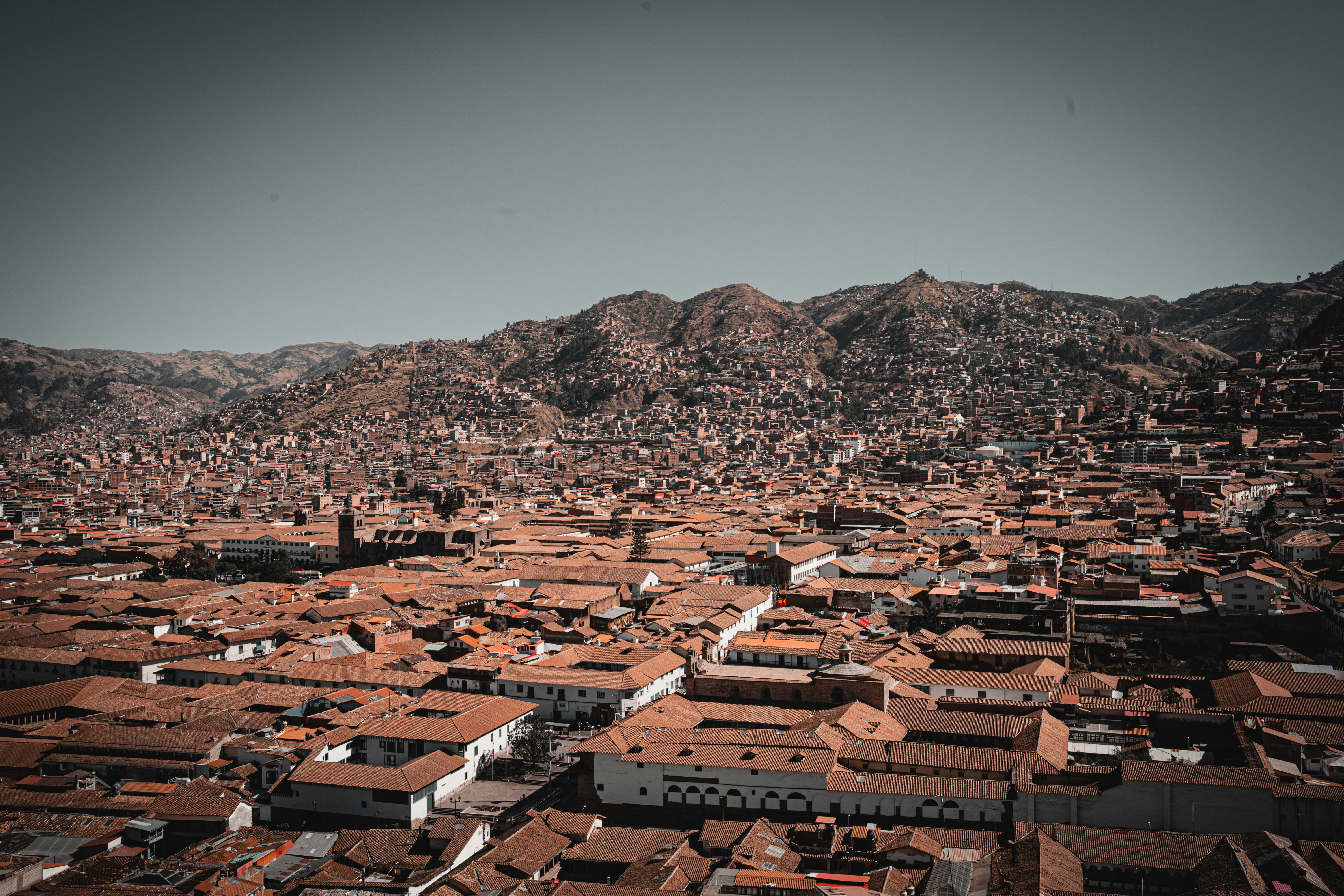 Cusco's Plaza de Armas at over 11,000 feet — the connection every Lima trip eventually leads to