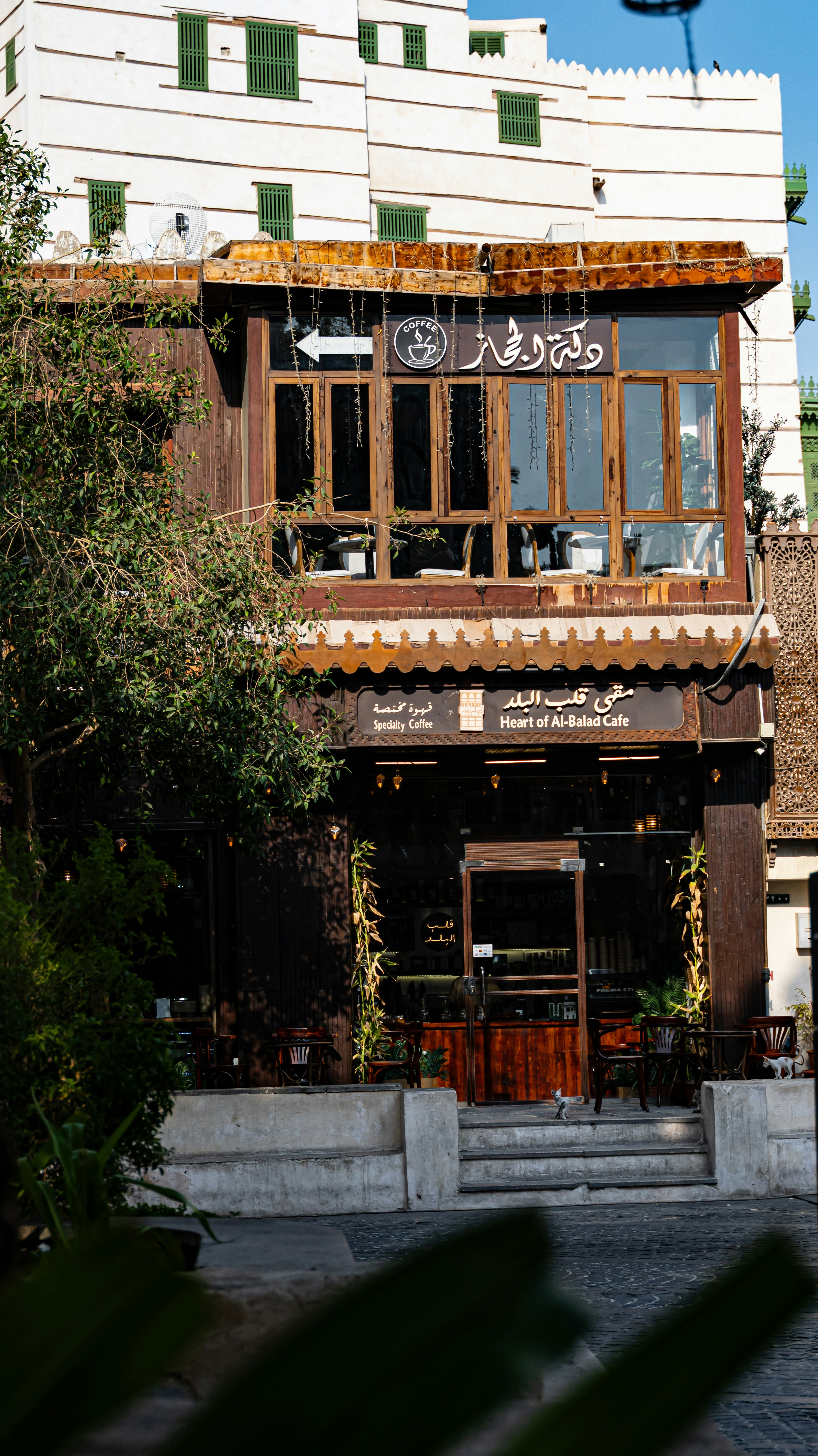 The Heart of Al-Balad Cafe with wooden facade and glass windows in Jeddah