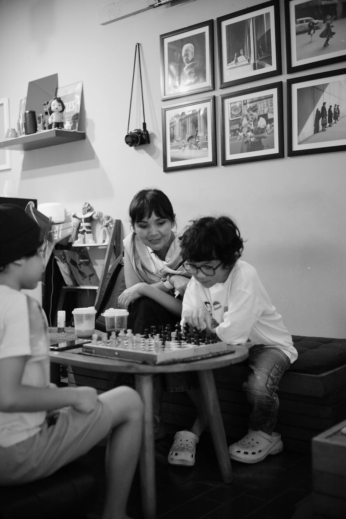 Family playing a tabletop strategy game together
