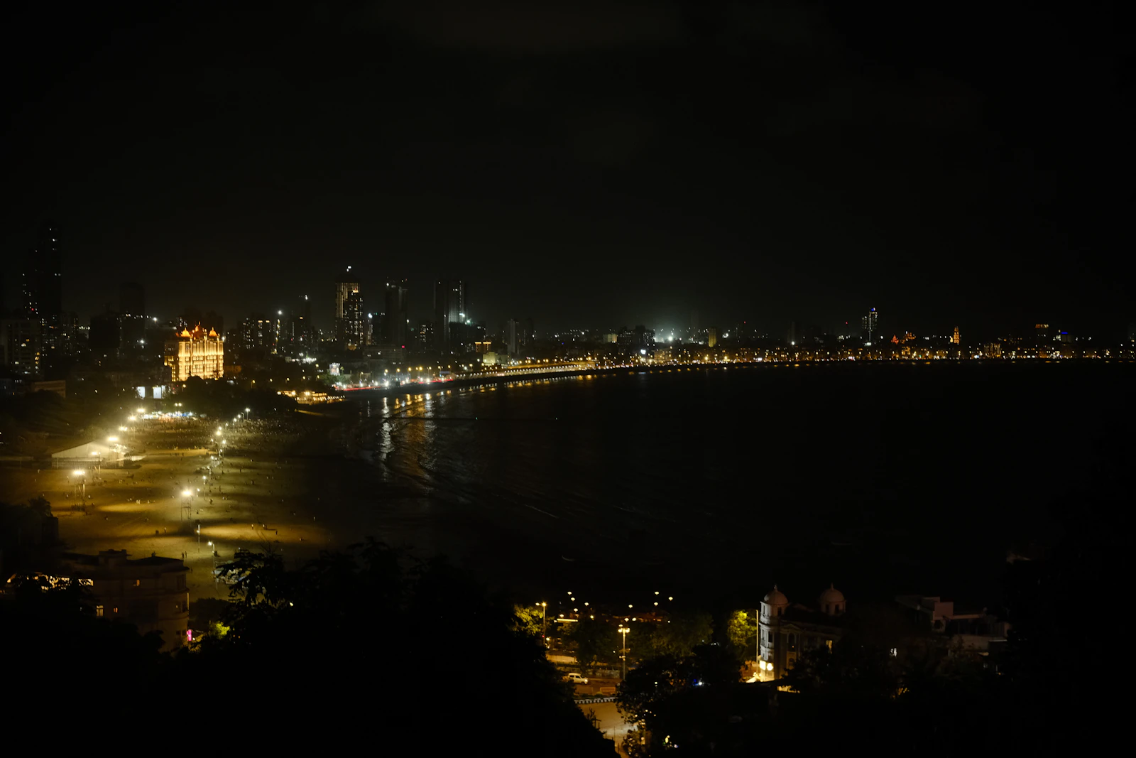 Marine Drive and the Mumbai skyline lit up at night