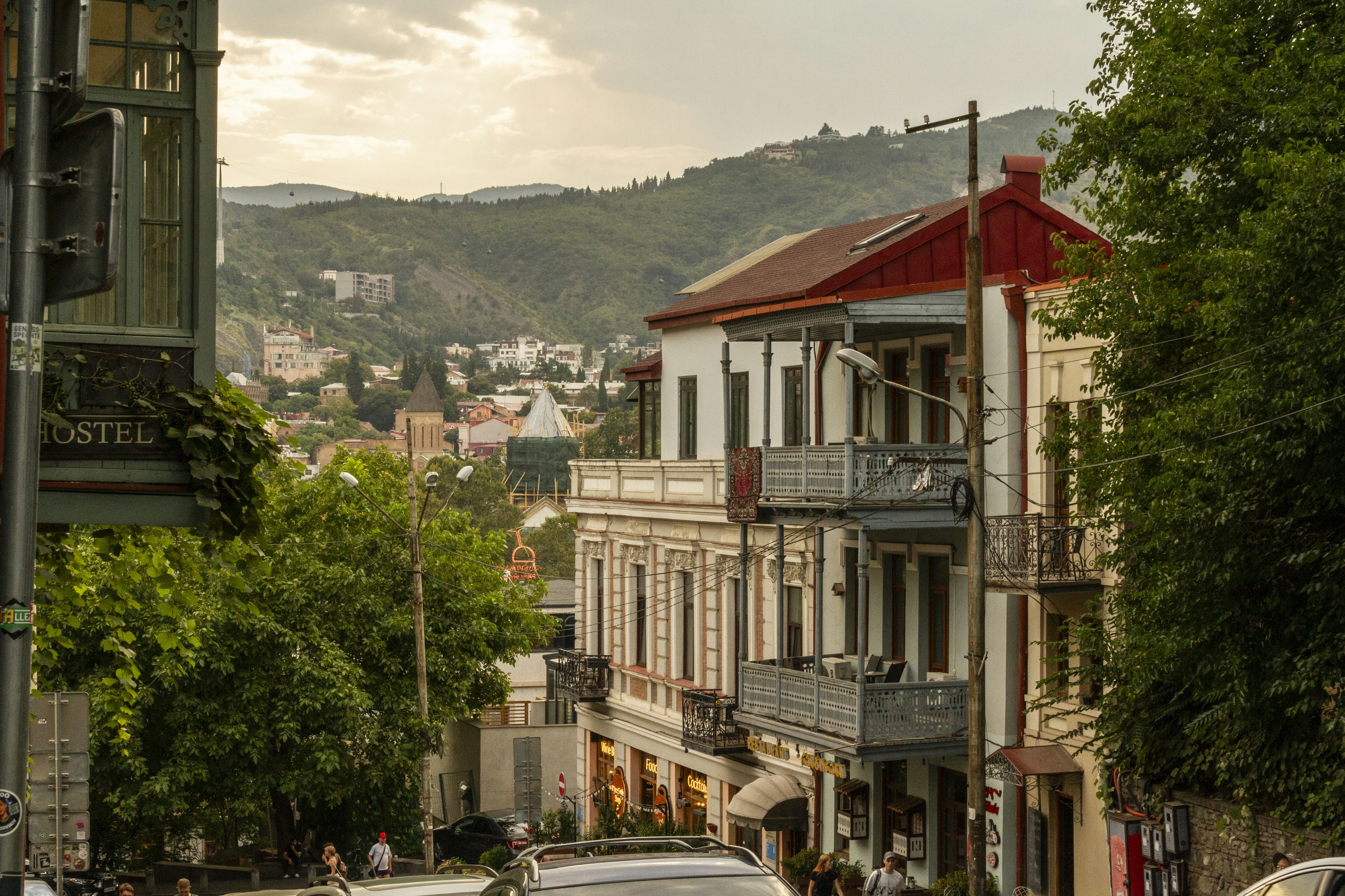 Historic buildings with ornate balconies on a street in Tbilisi, Georgia
