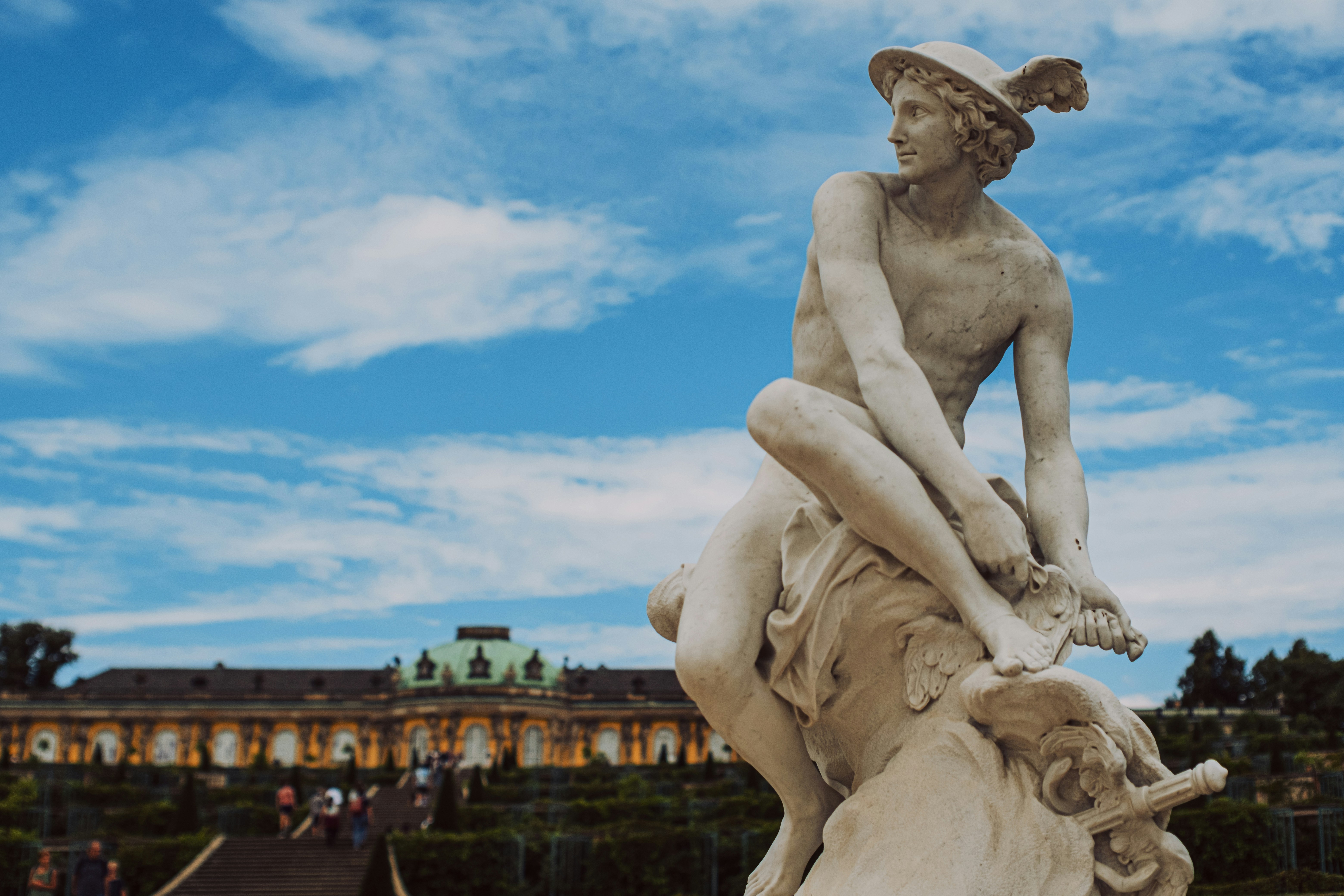 A marble statue of Mercury in the gardens of Sanssouci Palace in Potsdam