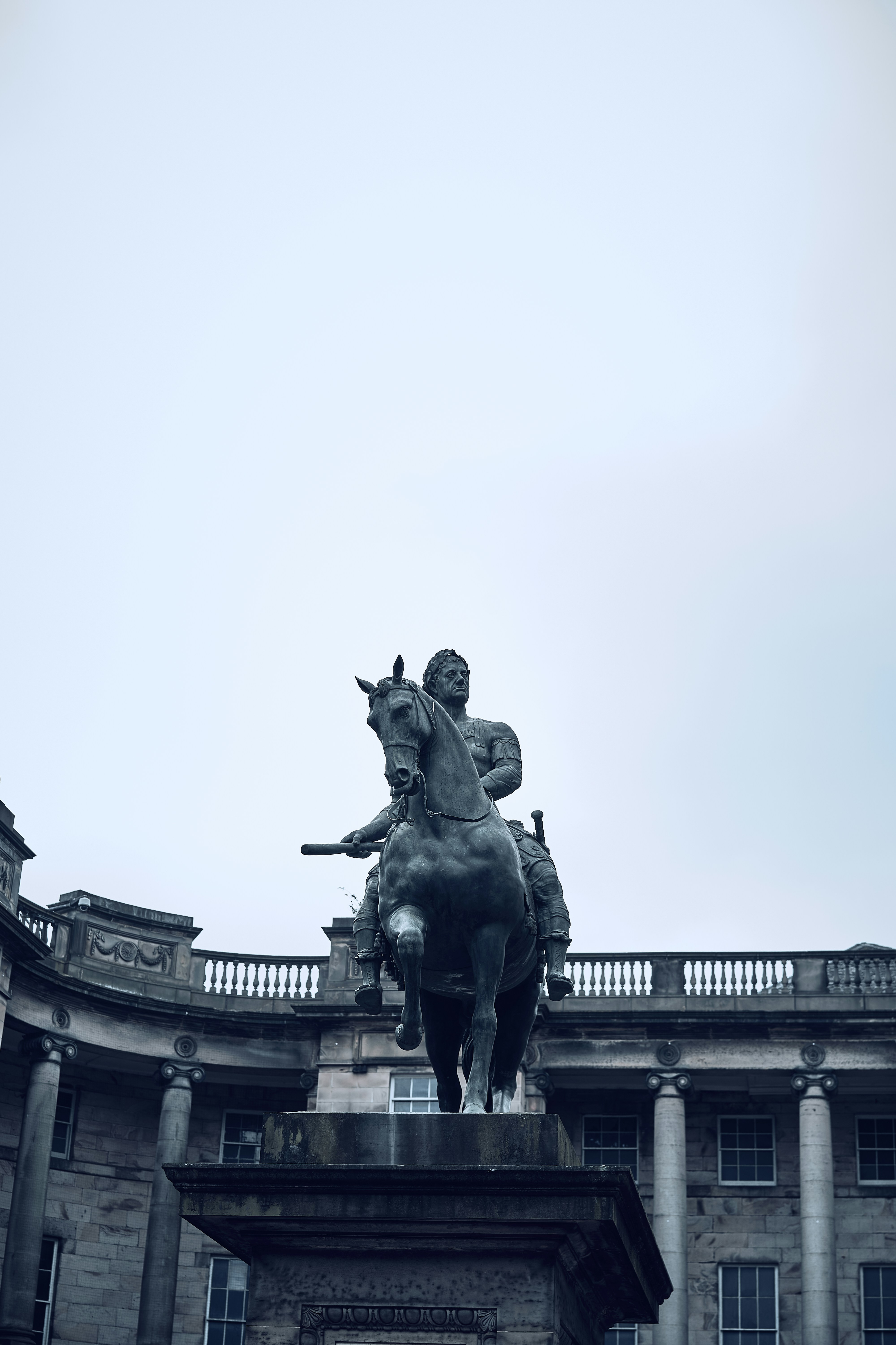 A monument and historic civic architecture in Edinburgh's Old Town.