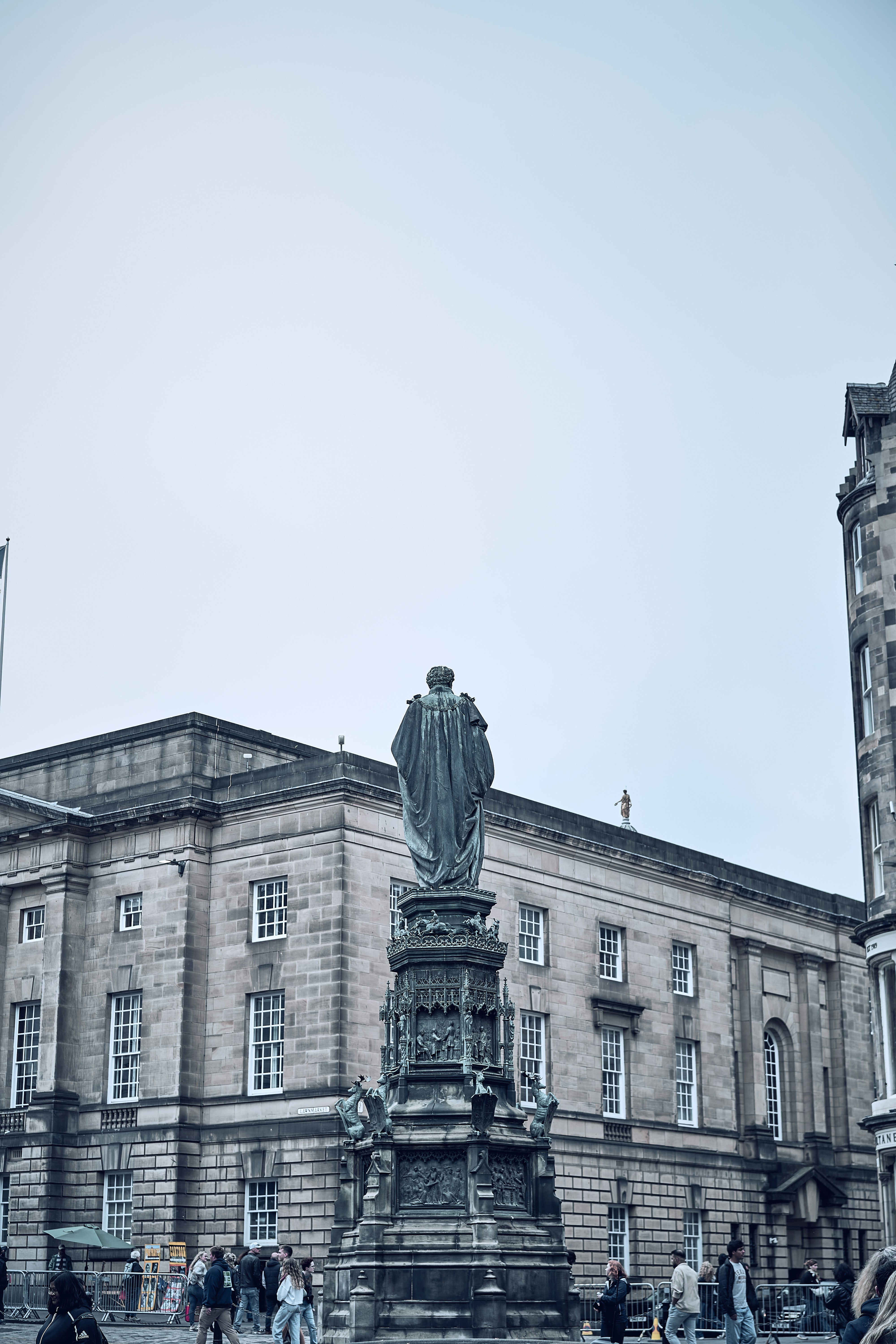A monument and historic civic architecture in Edinburgh's Old Town.