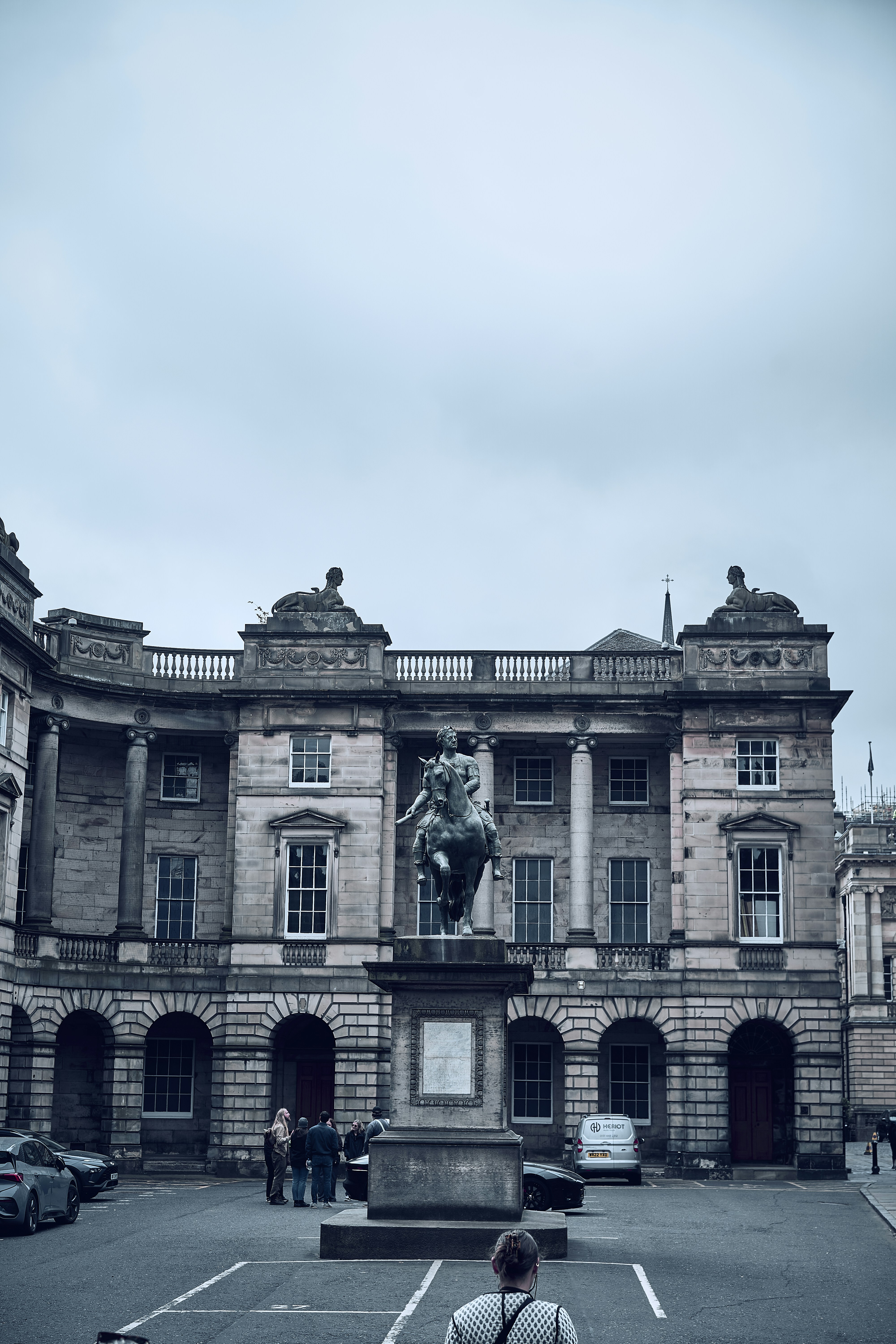 A monument and historic civic architecture in Edinburgh's Old Town.