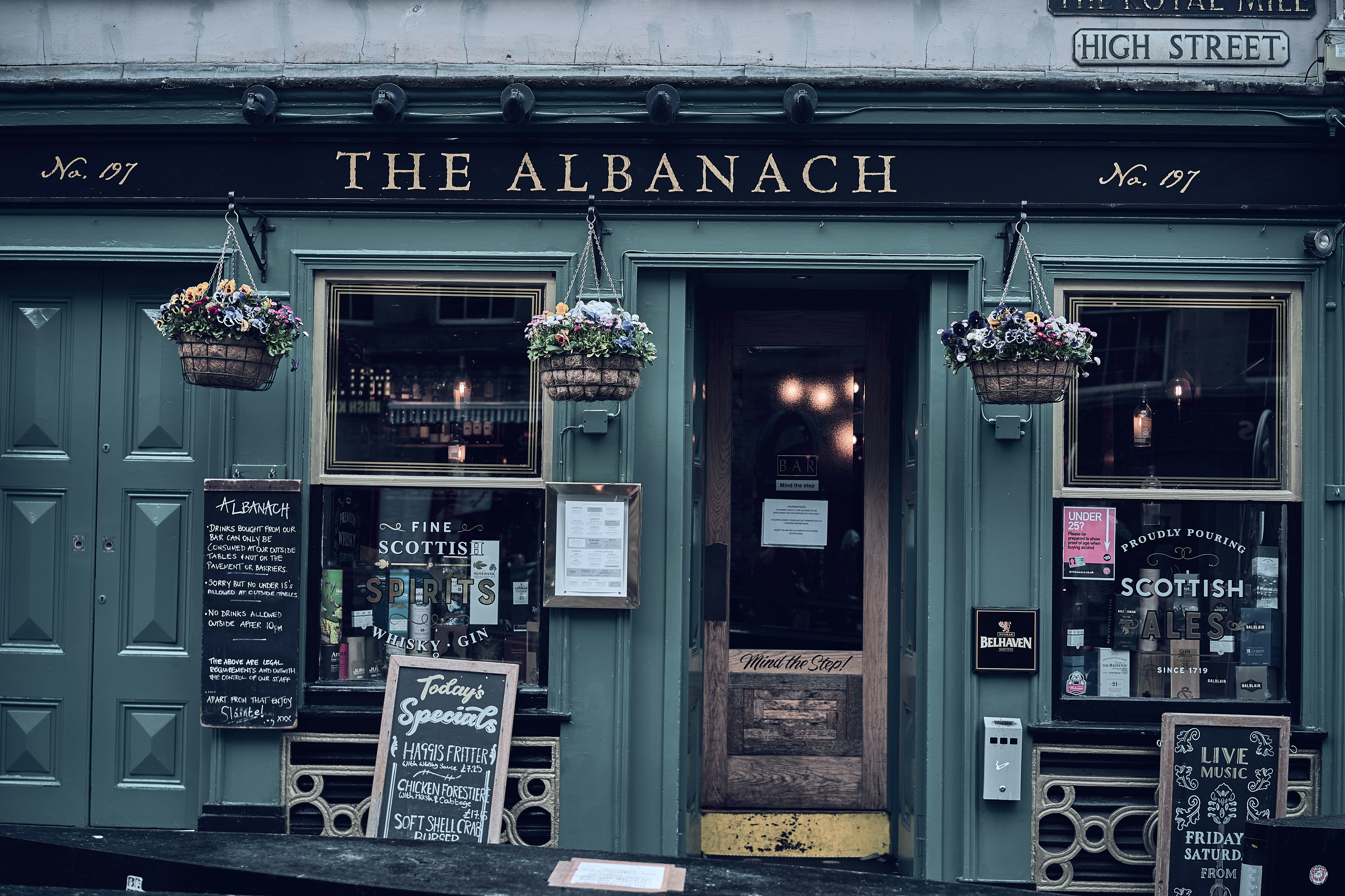 A traditional pub facade in Edinburgh's Old Town, Scotland.