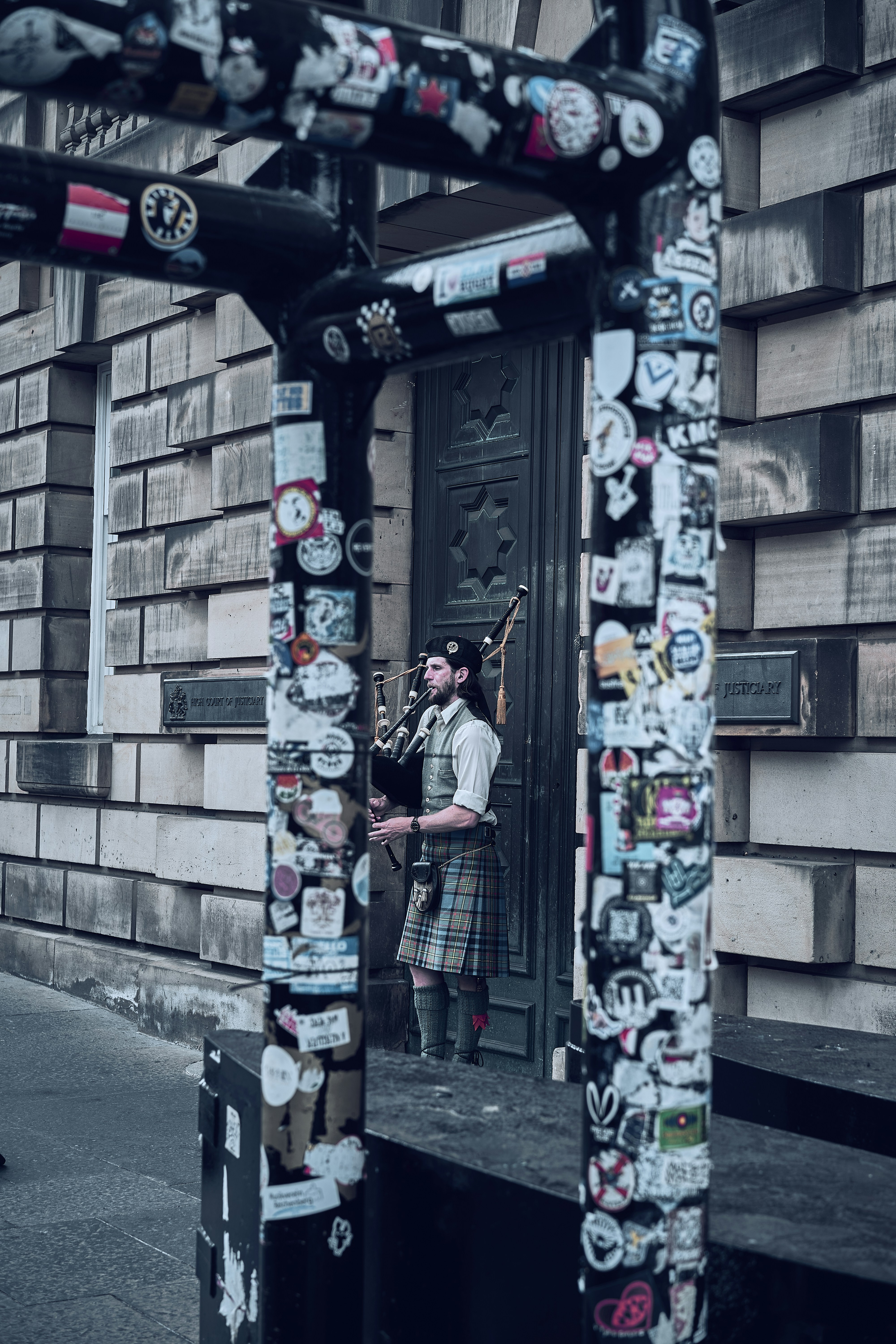 A sticker-covered street detail in Edinburgh's Old Town.