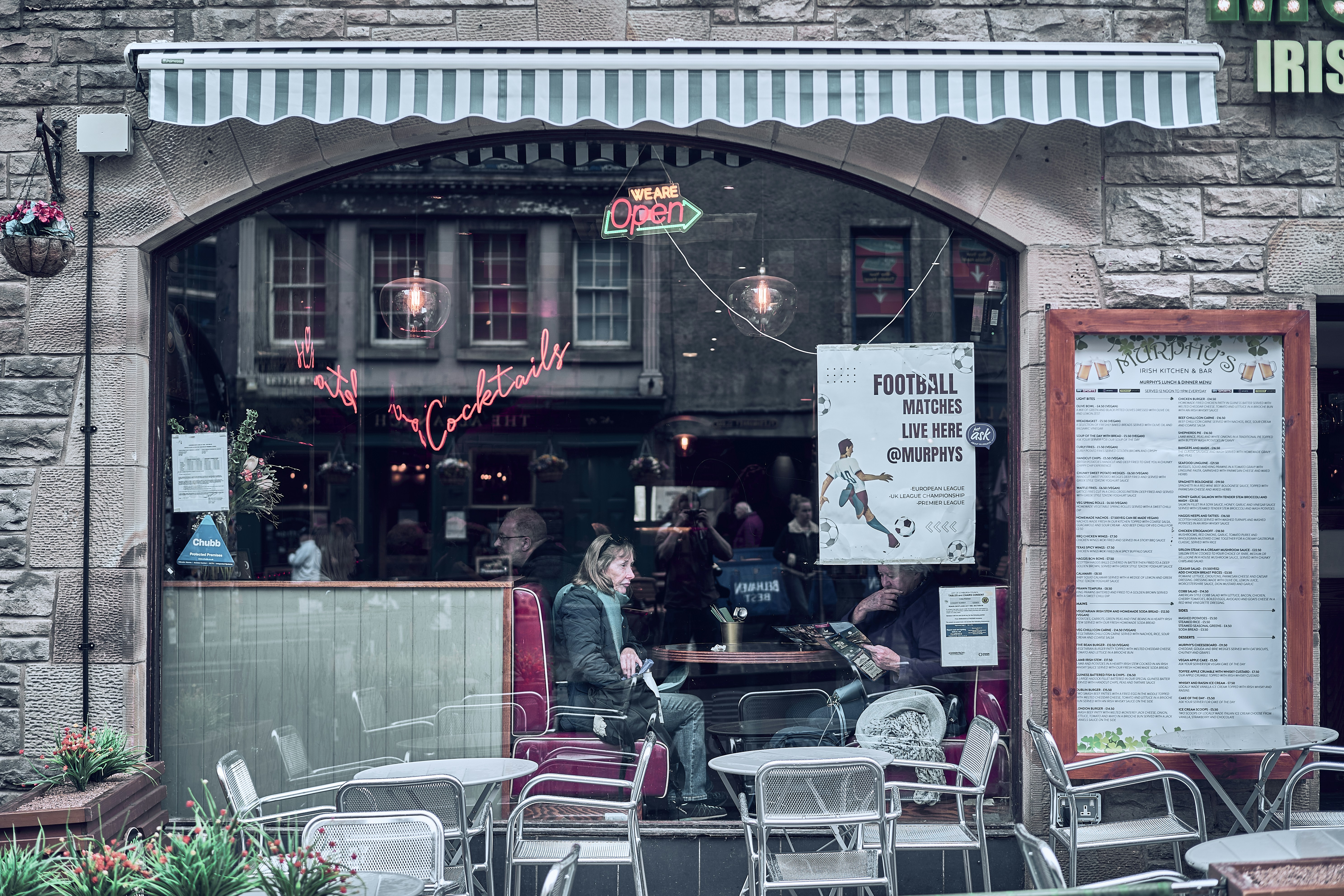 People sitting inside a pub