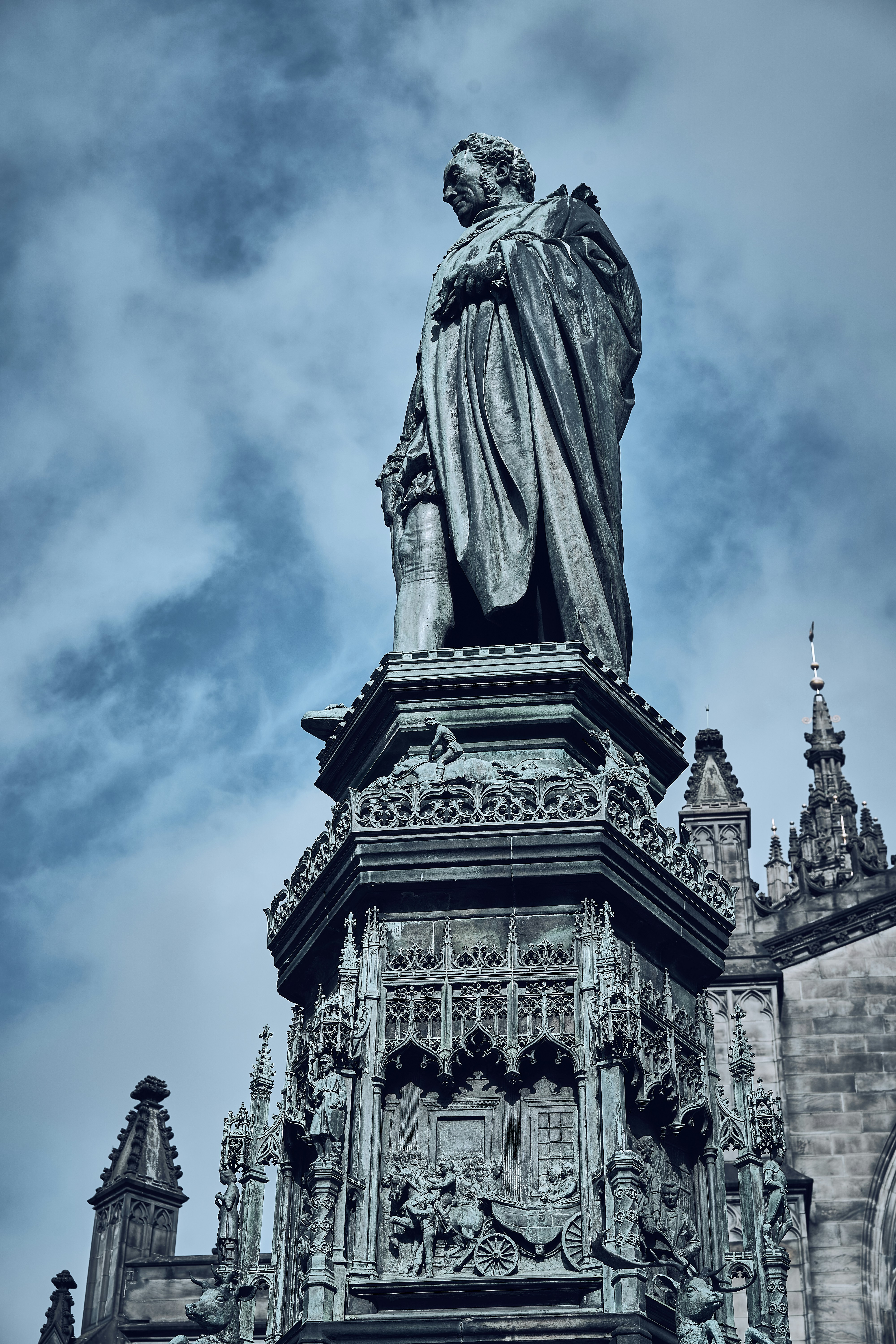 A monument and historic civic architecture in Edinburgh's Old Town.