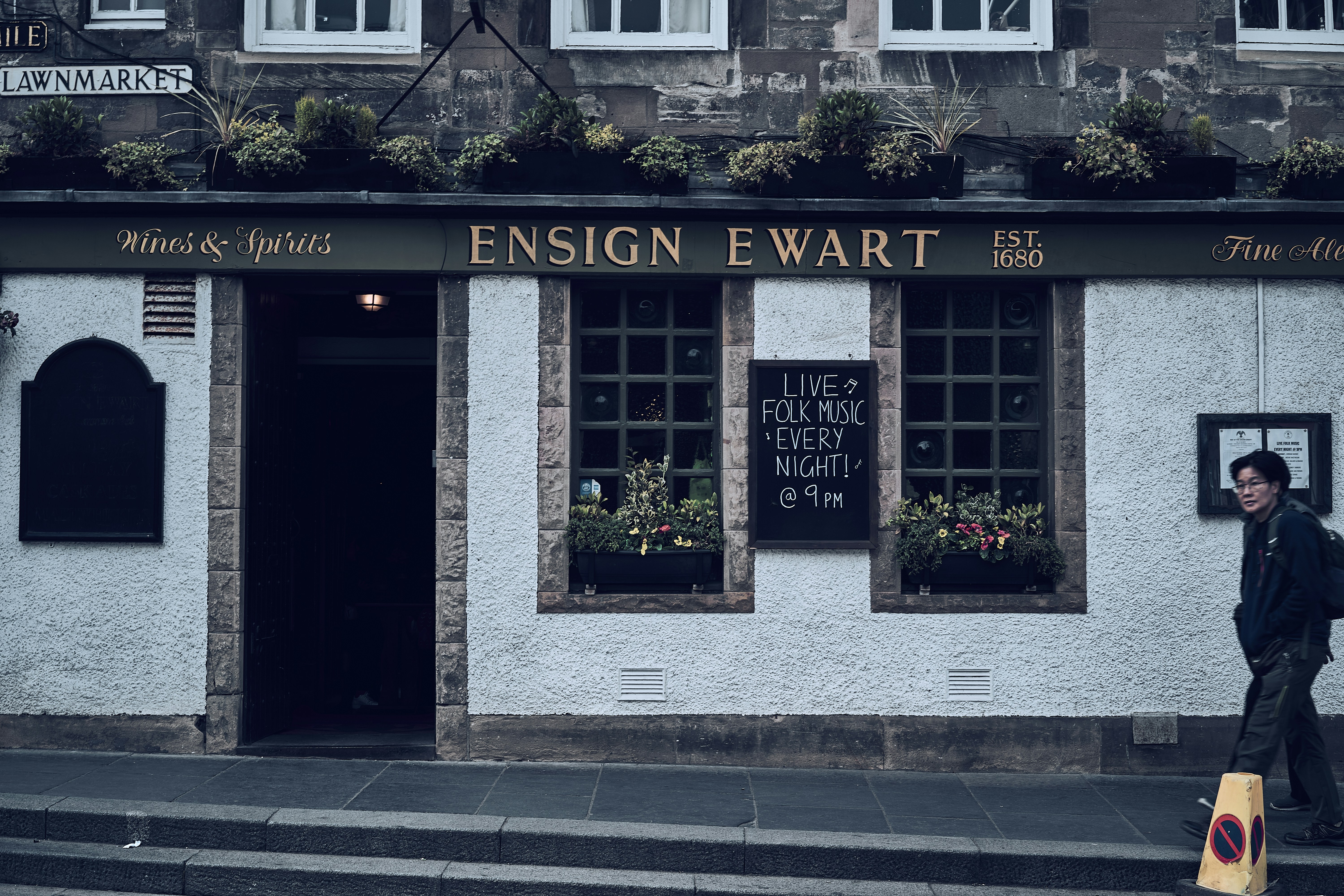 A traditional pub facade in Edinburgh's Old Town, Scotland.