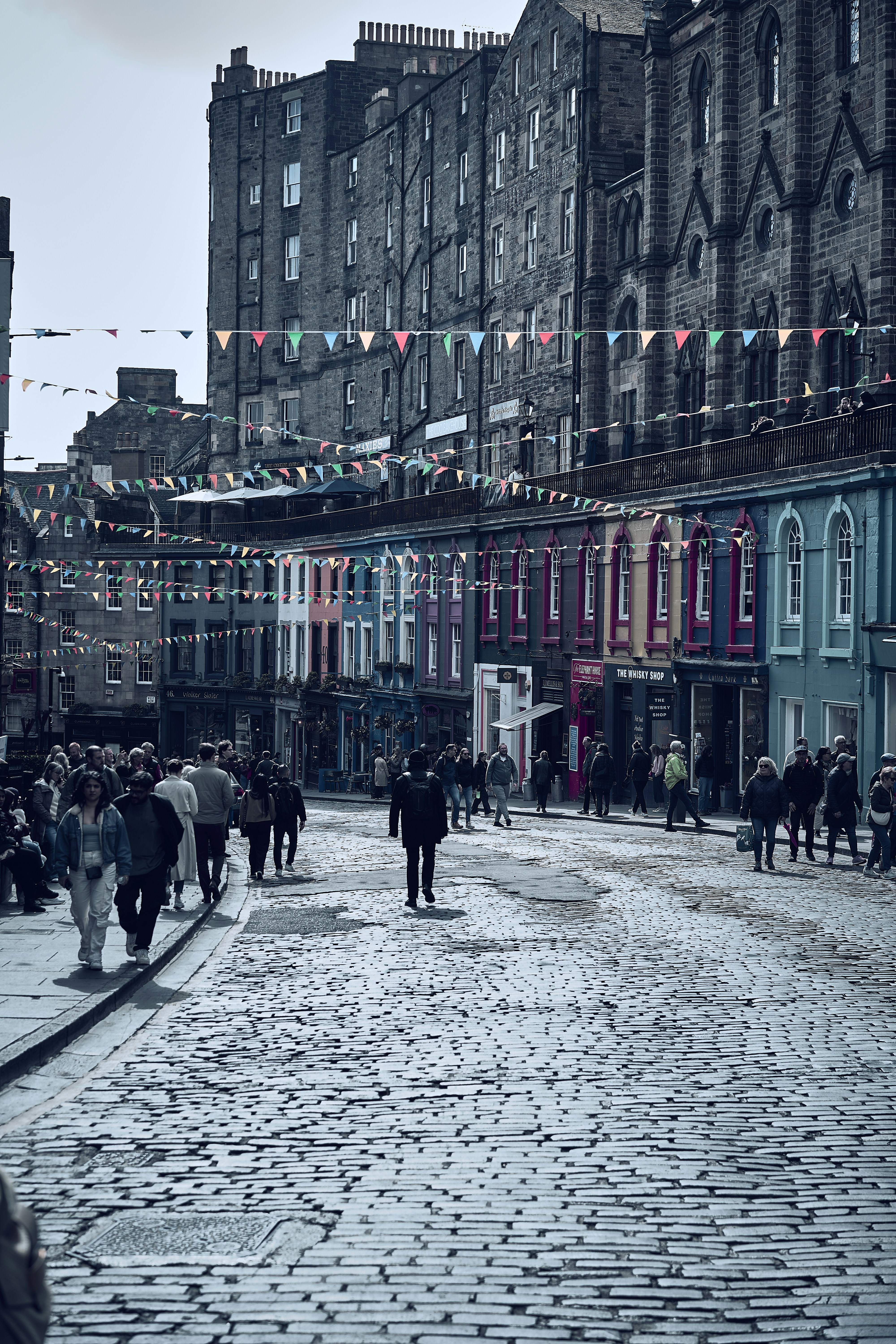 A cobblestone street in Edinburgh's Old Town, Scotland.