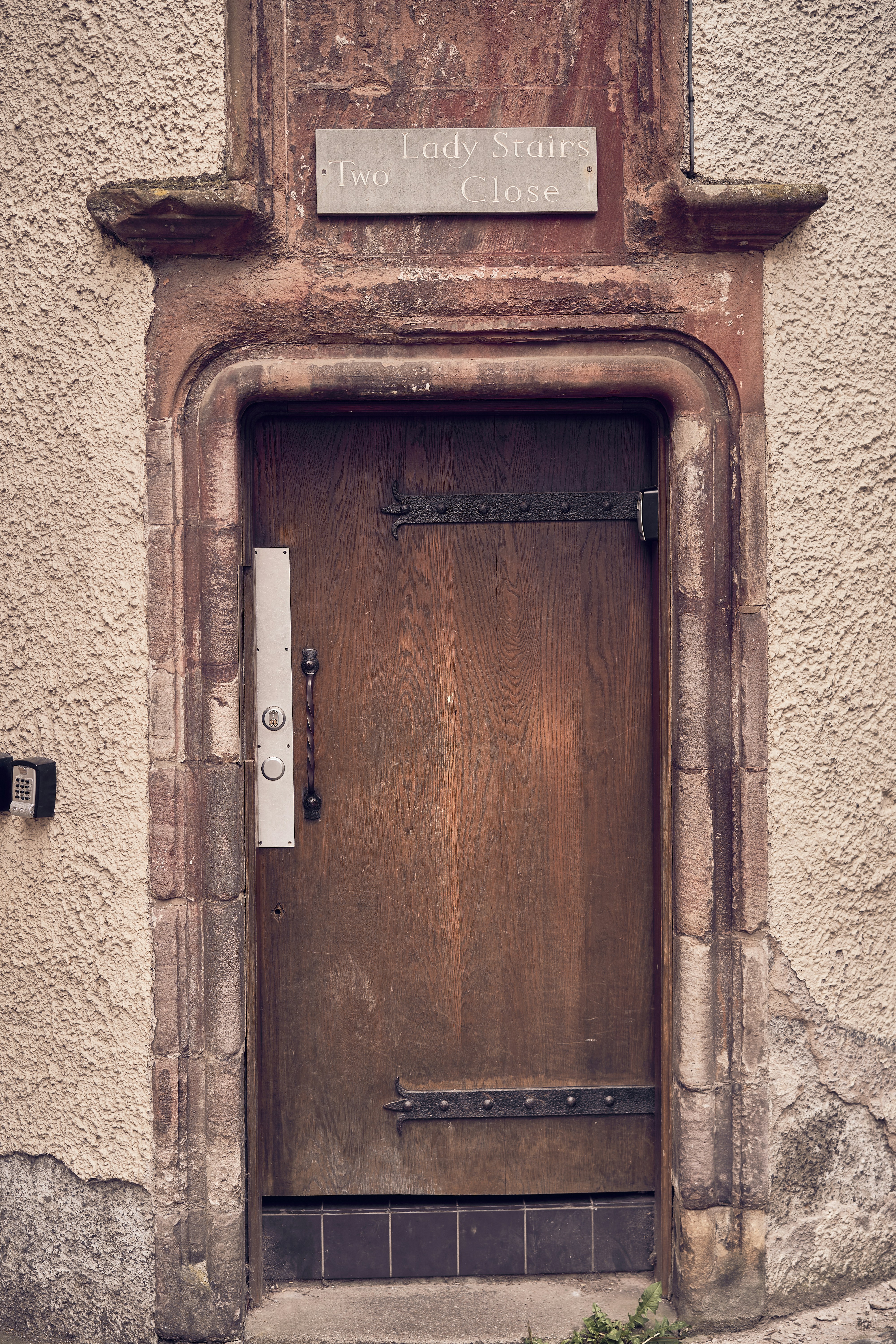A historic close and stone detail in Edinburgh's Old Town.