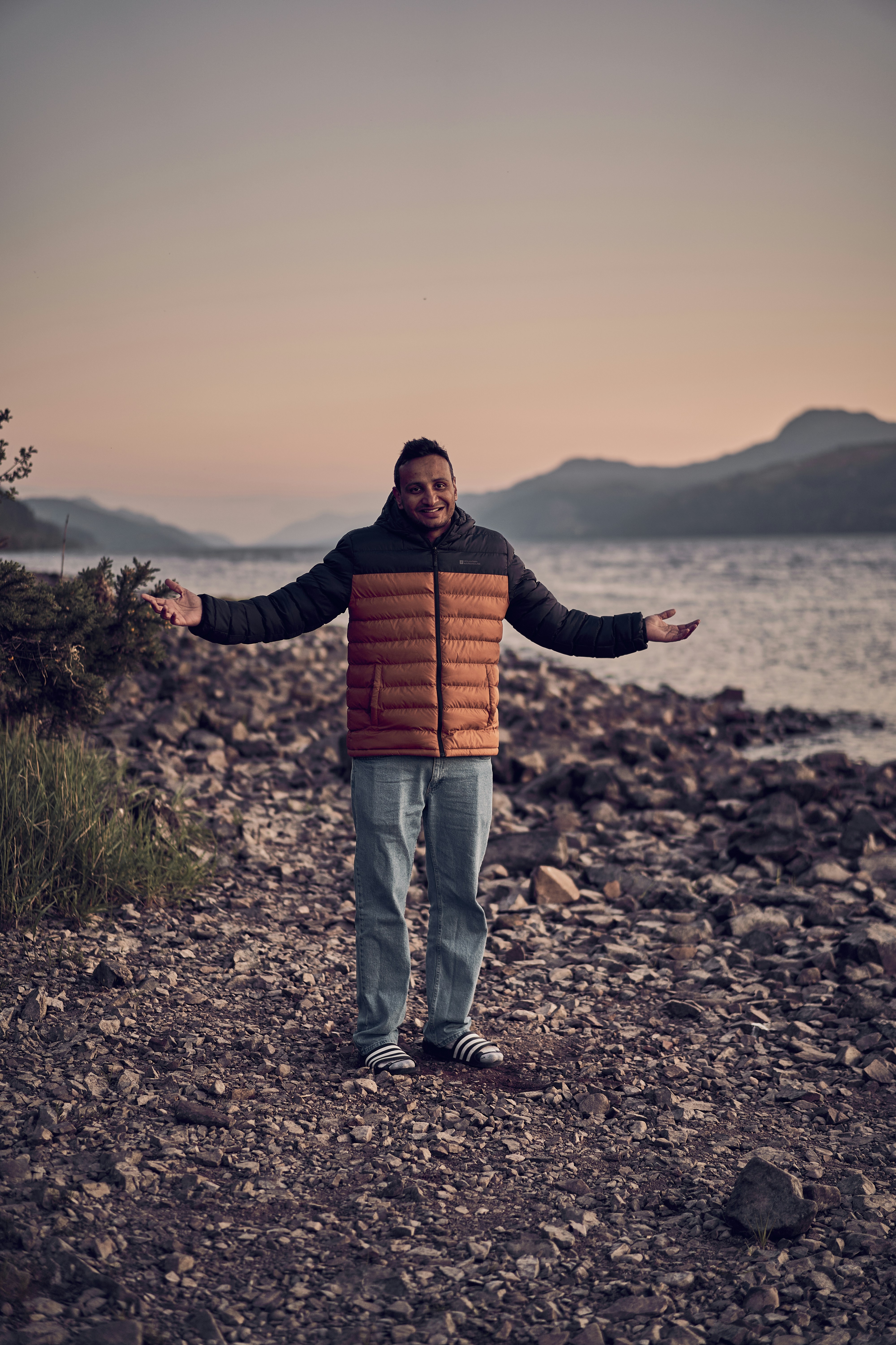 A playful portrait on the rocky shore of Loch Lomond in Scotland.
