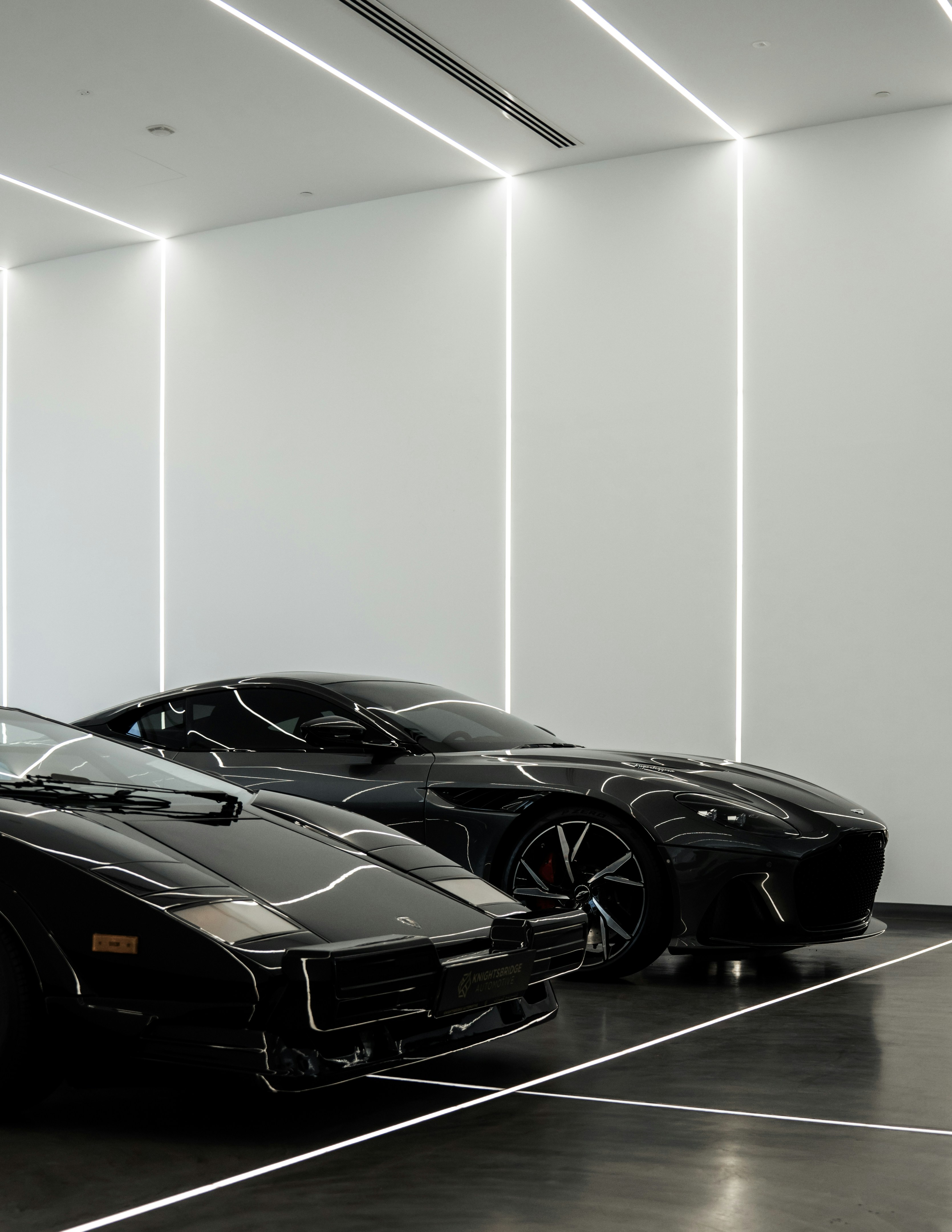 luxury car garage minimalist, wallpaper, Aston Martin Wagon Recalls 2026: Safety and Reliability Guide 3