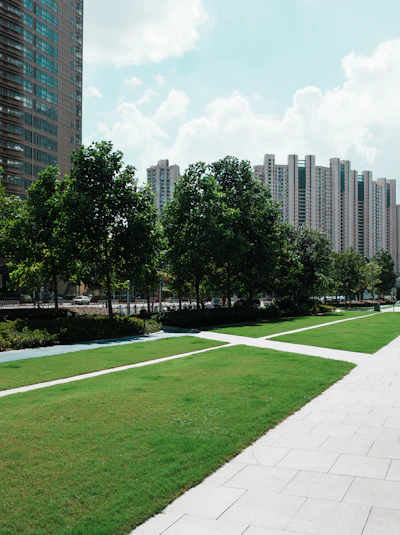 Walkway through a lawn between apartment buildings