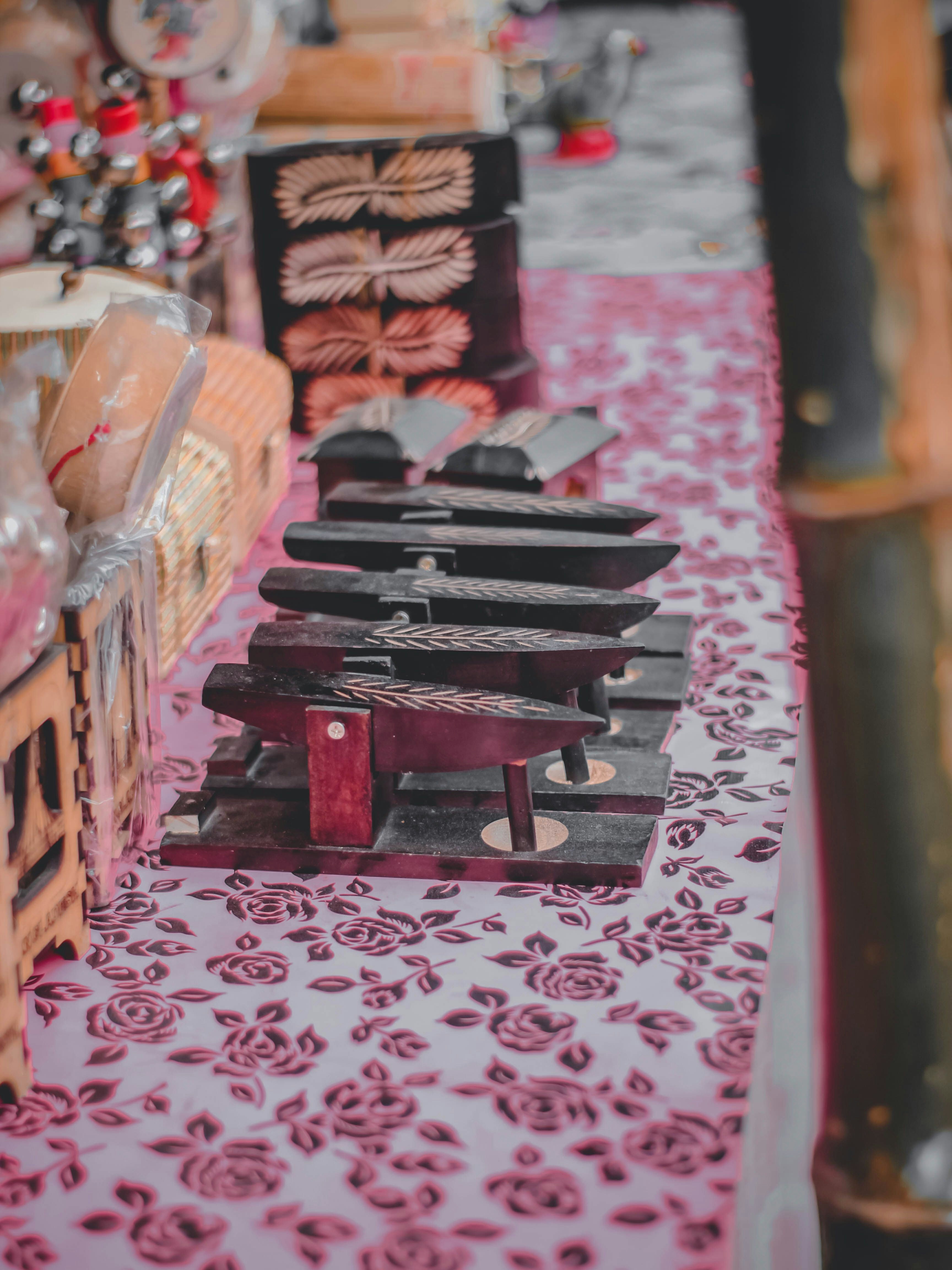 Hand-carved wooden printing blocks with floral and geometric motifs