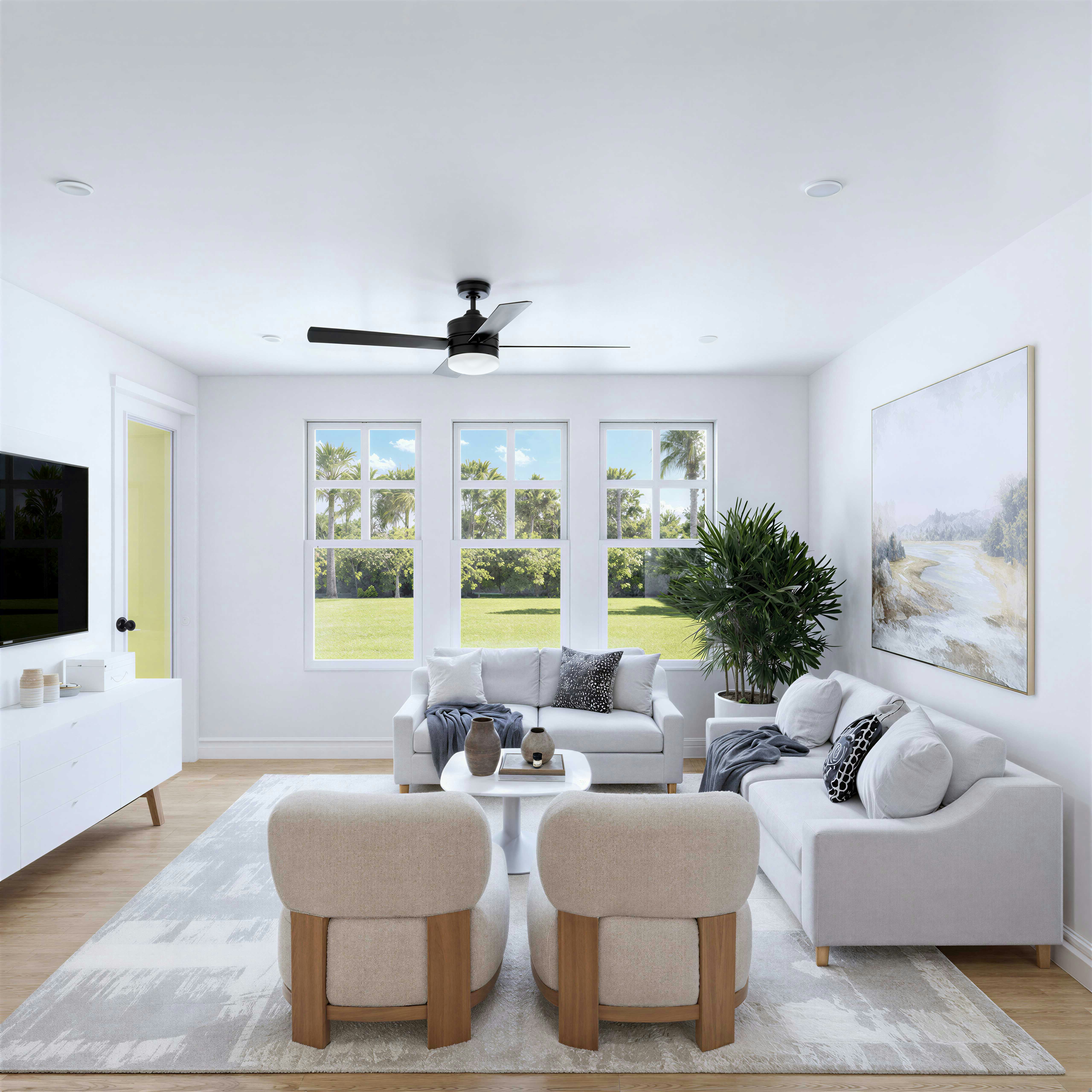 A bright living room with two sofas, two armchairs, and a large potted plant