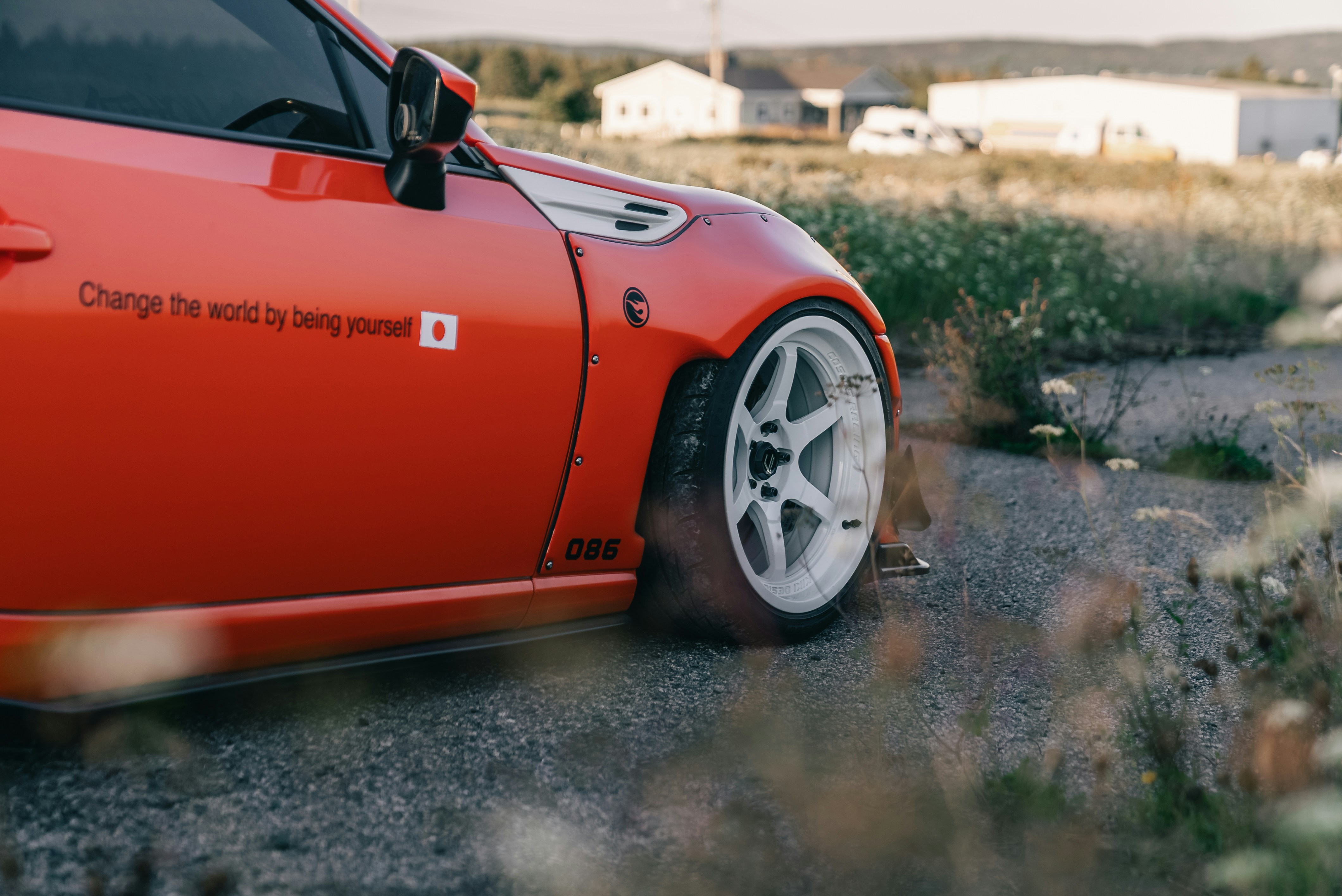 Red sports car with white rims - Free Photo on Unsplash