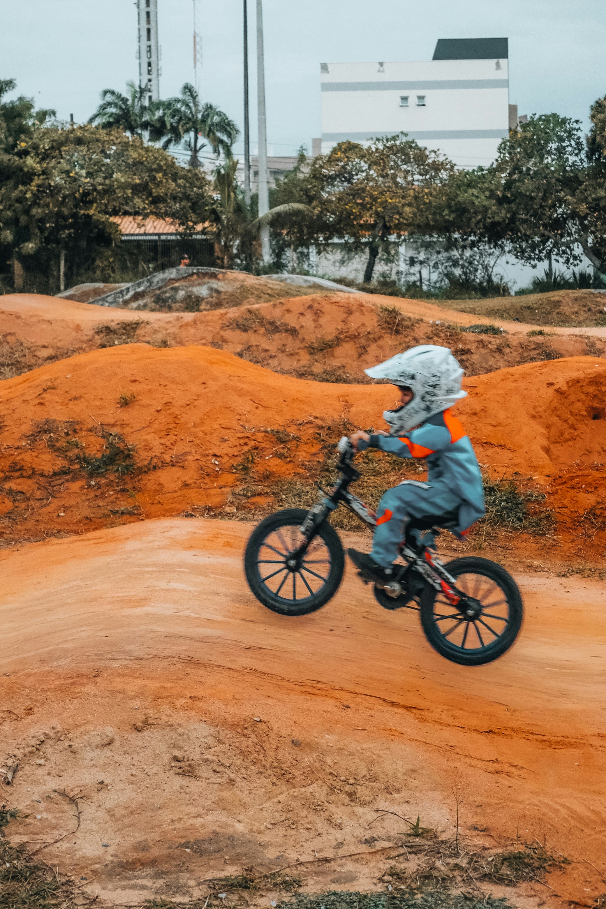 Child riding bicycle on dirt jump - Free Photo on Unsplash
